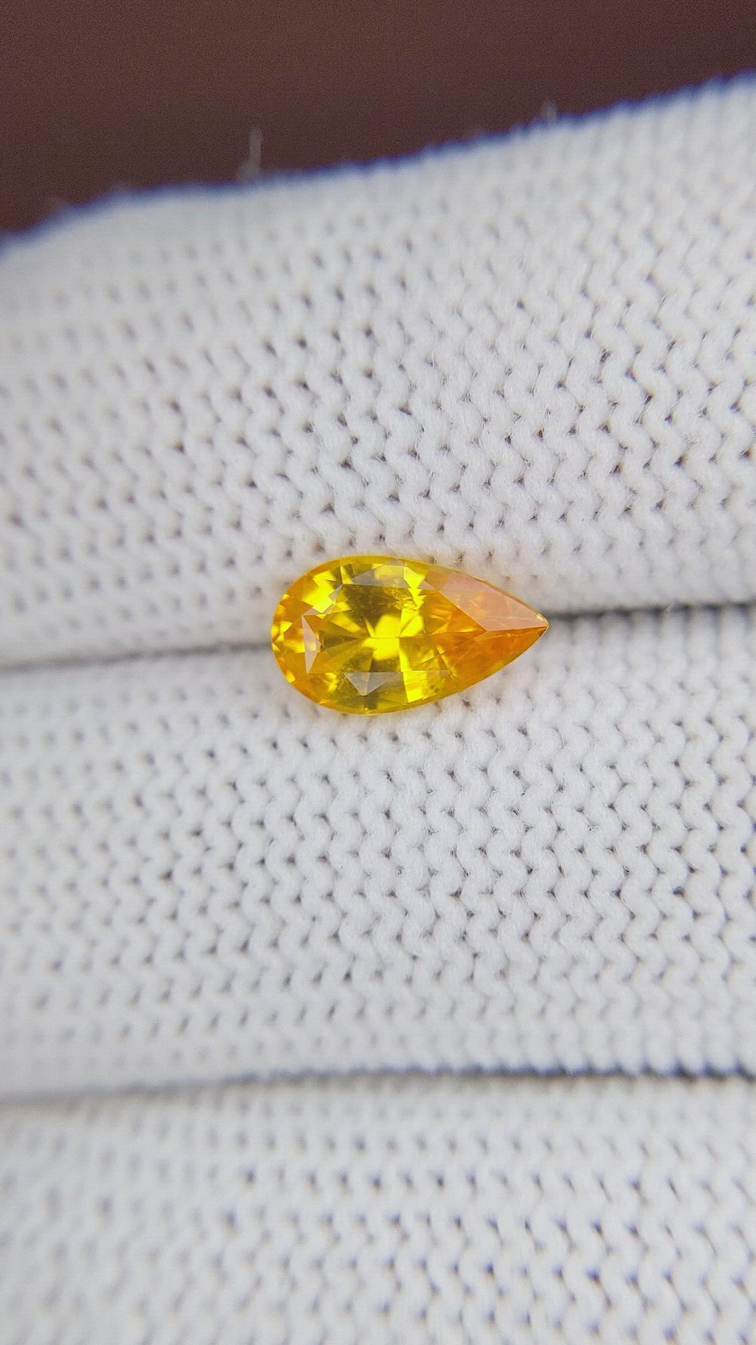 1.66 Ct. Orangish Yellow Sapphire from Ceylon (Sri Lanka) Size Video
