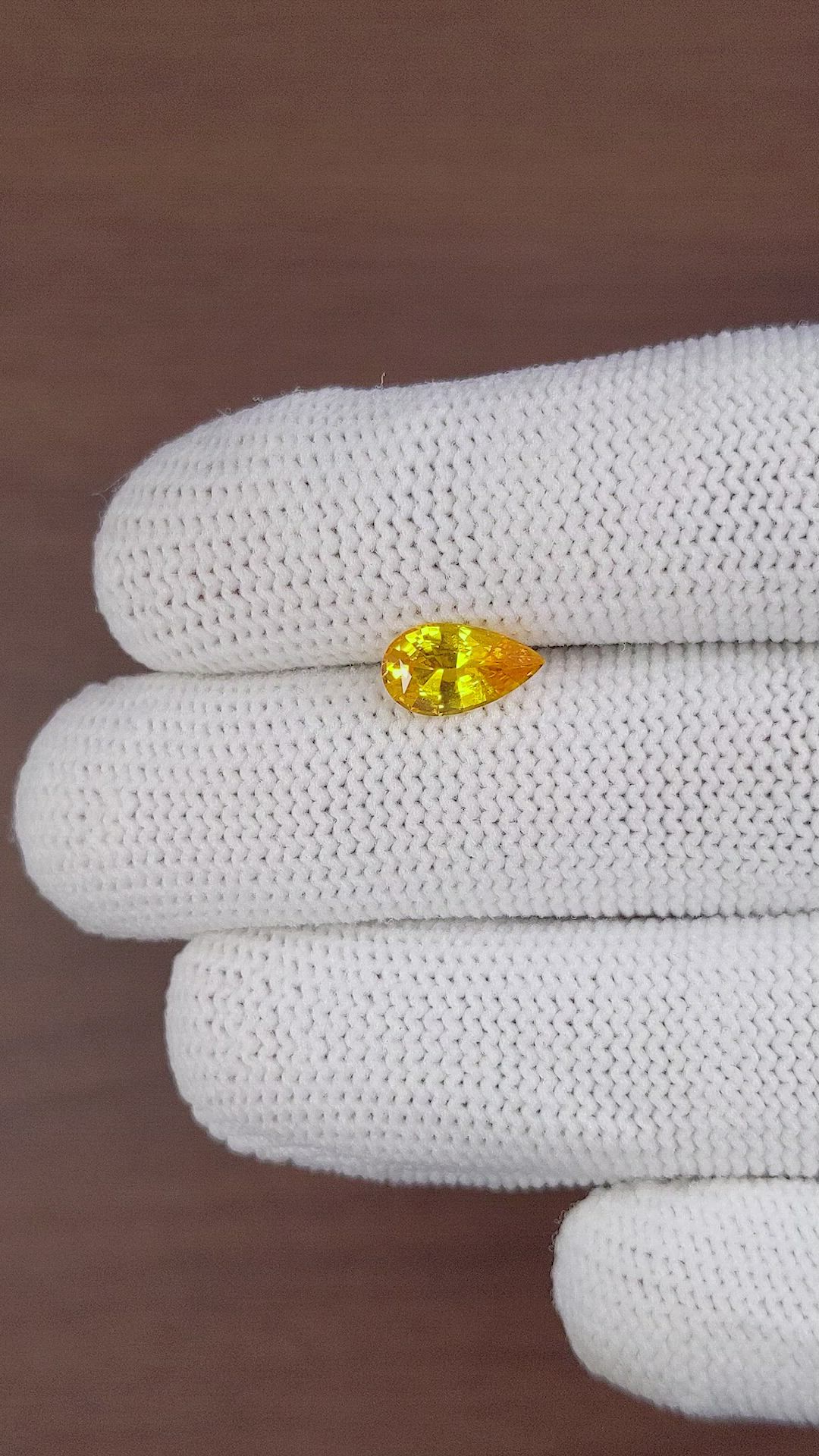 1.66 Ct. Orangish Yellow Sapphire from Ceylon (Sri Lanka) Size Video