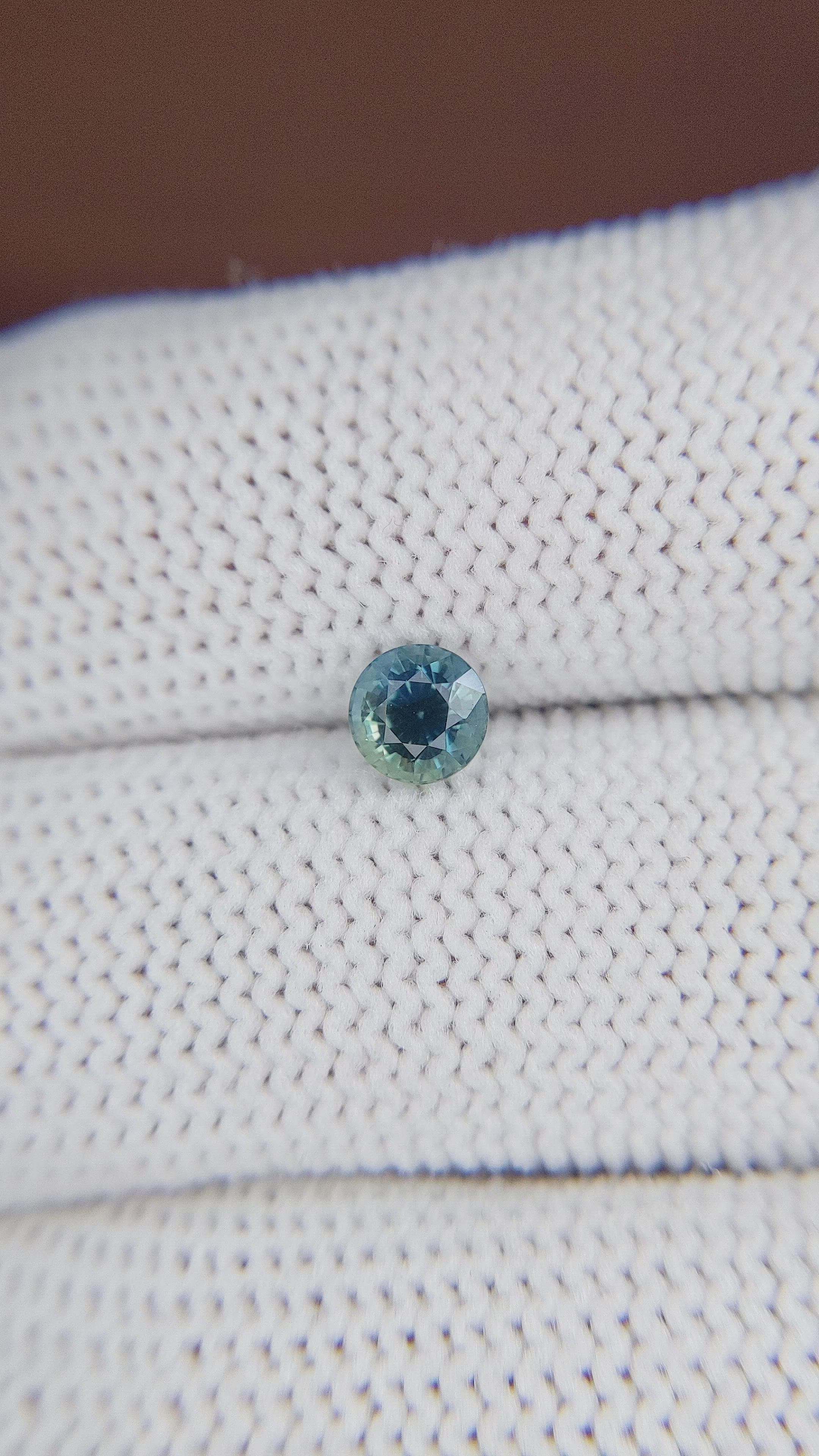 0.72 Ct. Greenish Blue Sapphire from Madagascar Size Video
