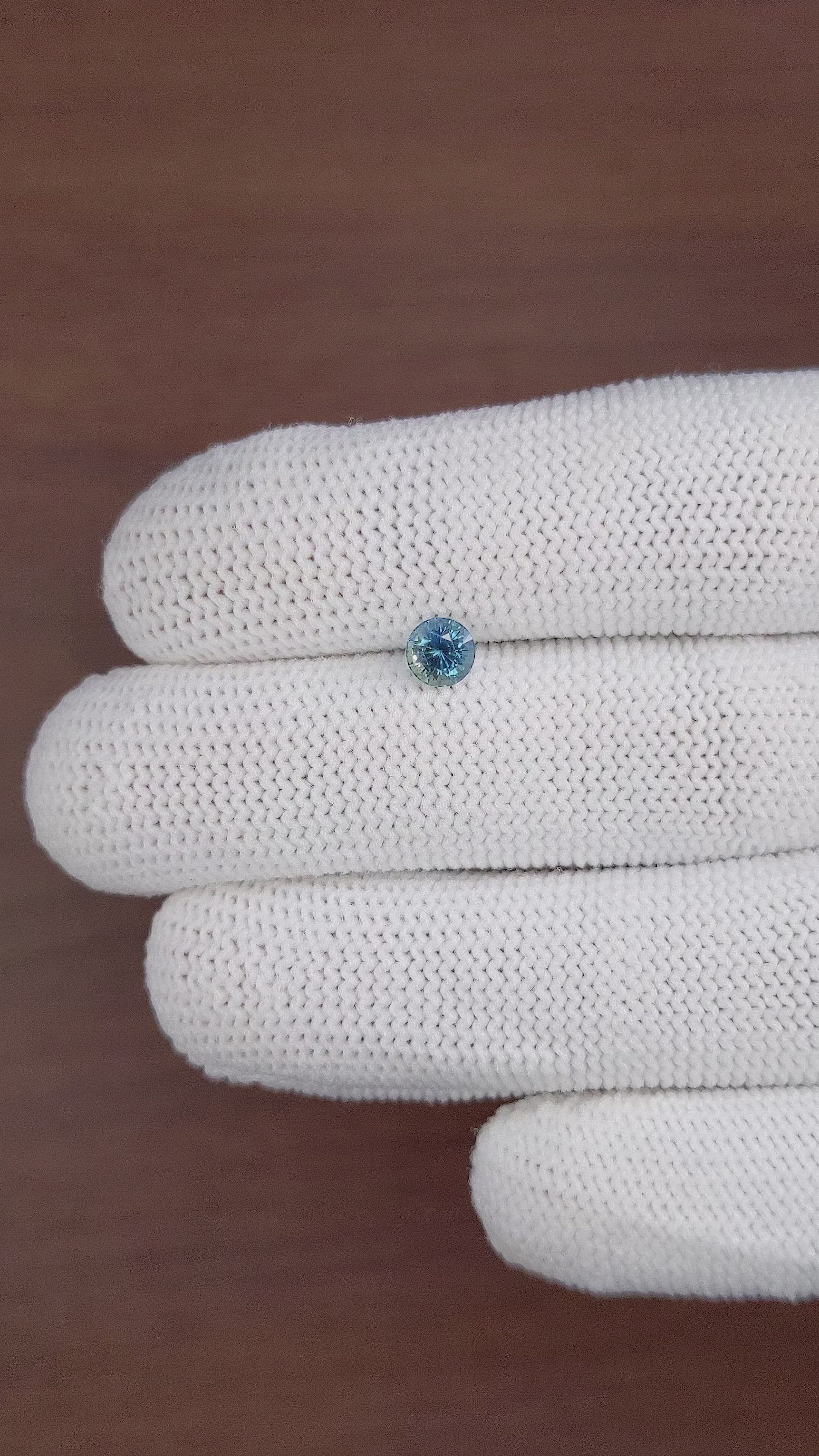 0.72 Ct. Greenish Blue Sapphire from Madagascar Size Video