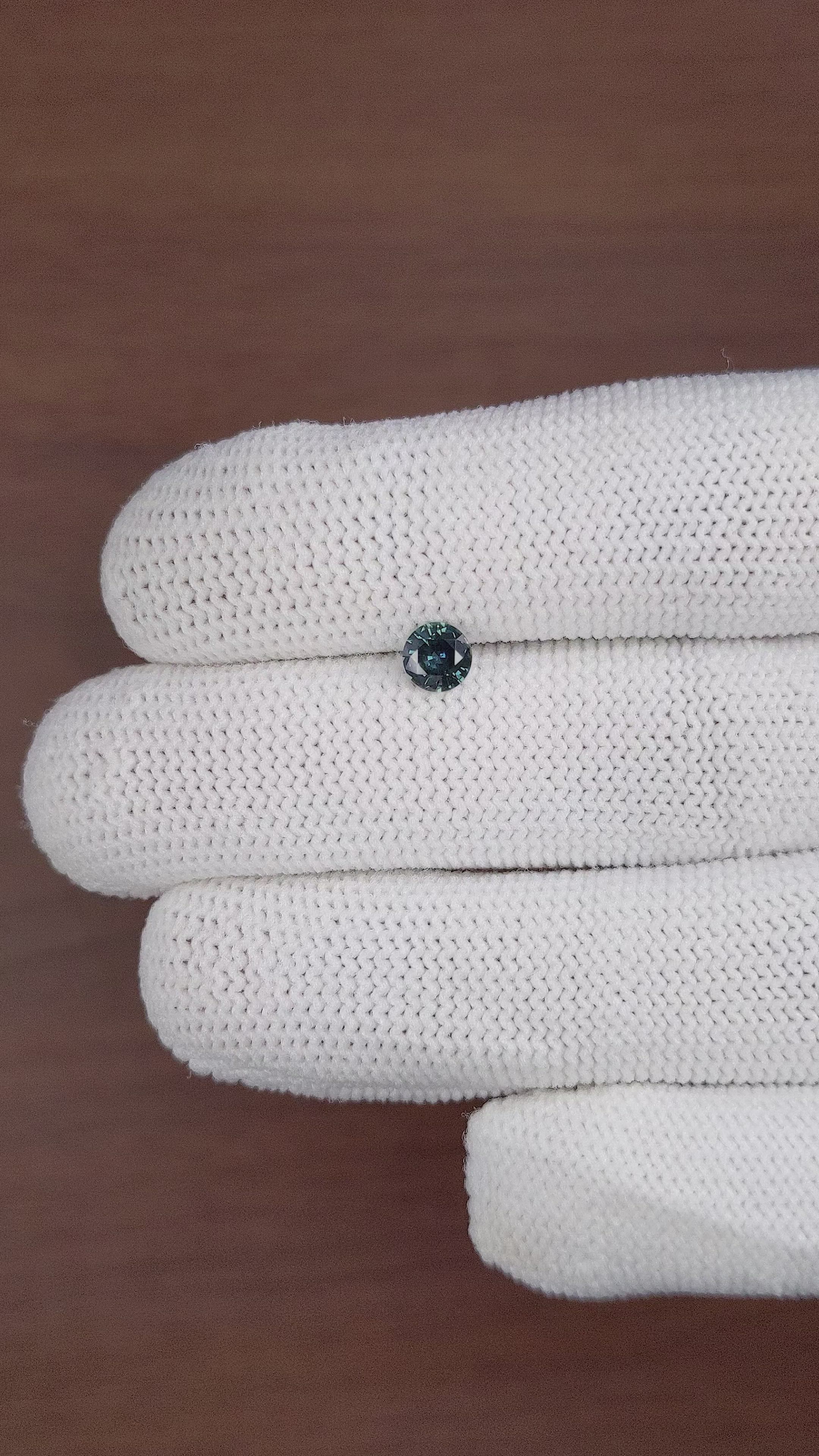 0.53 Ct. Bluish Green Sapphire from Madagascar Size Video