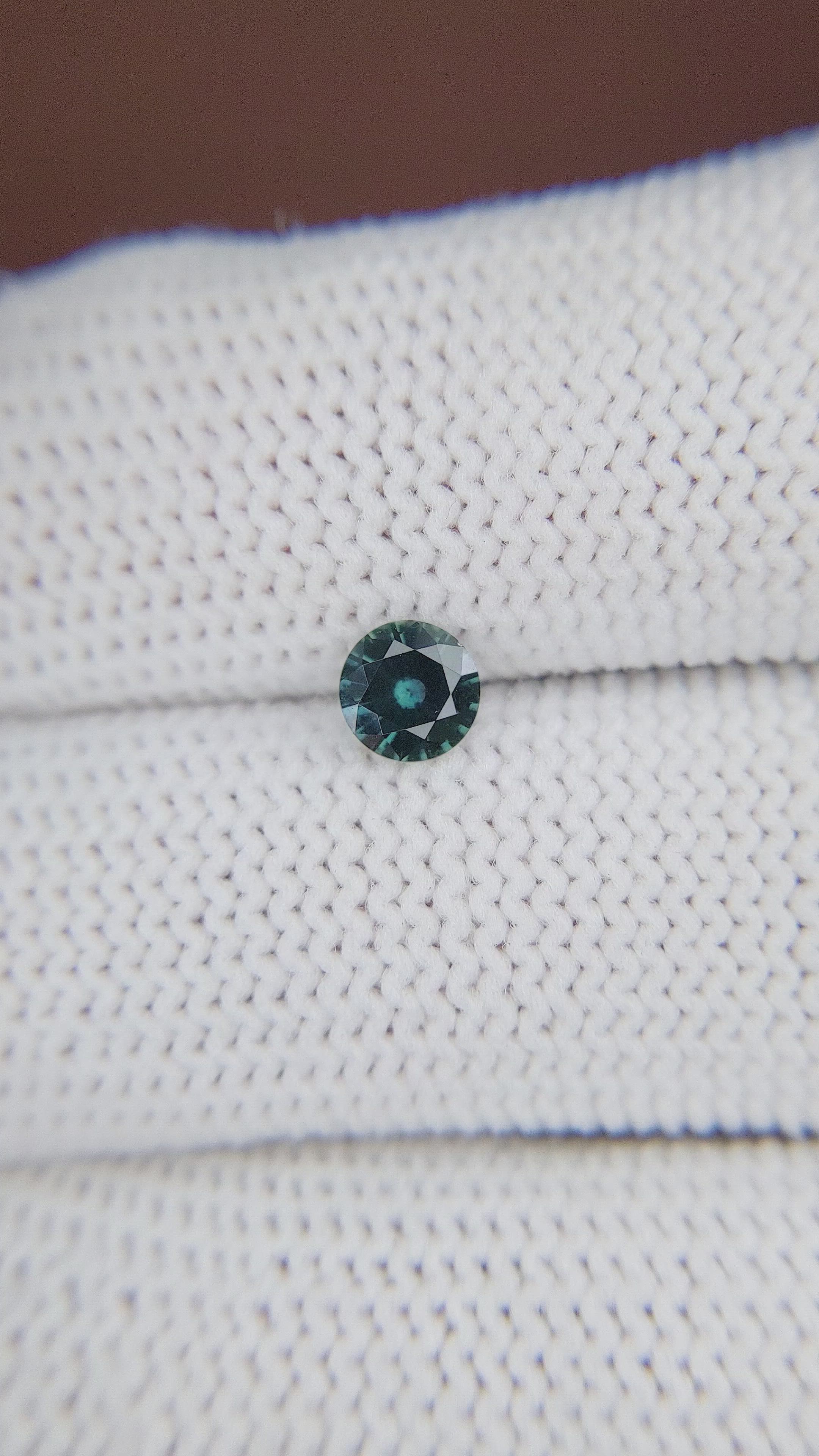 0.53 Ct. Bluish Green Sapphire from Madagascar Size Video