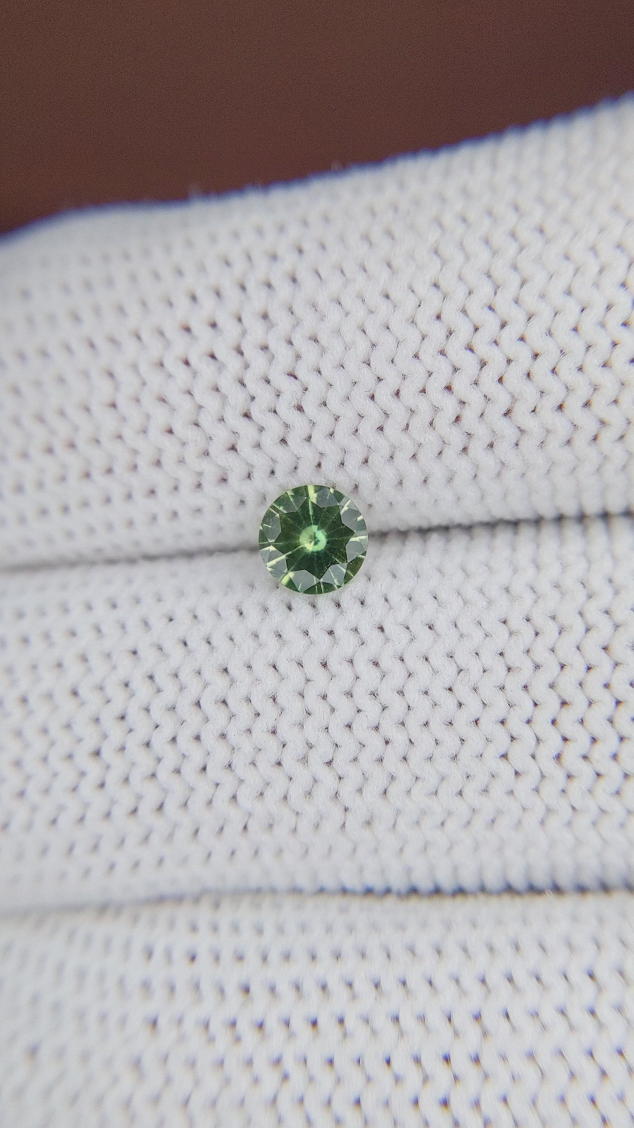 0.47 Ct. Yellowish Green Sapphire from Madagascar Size Video