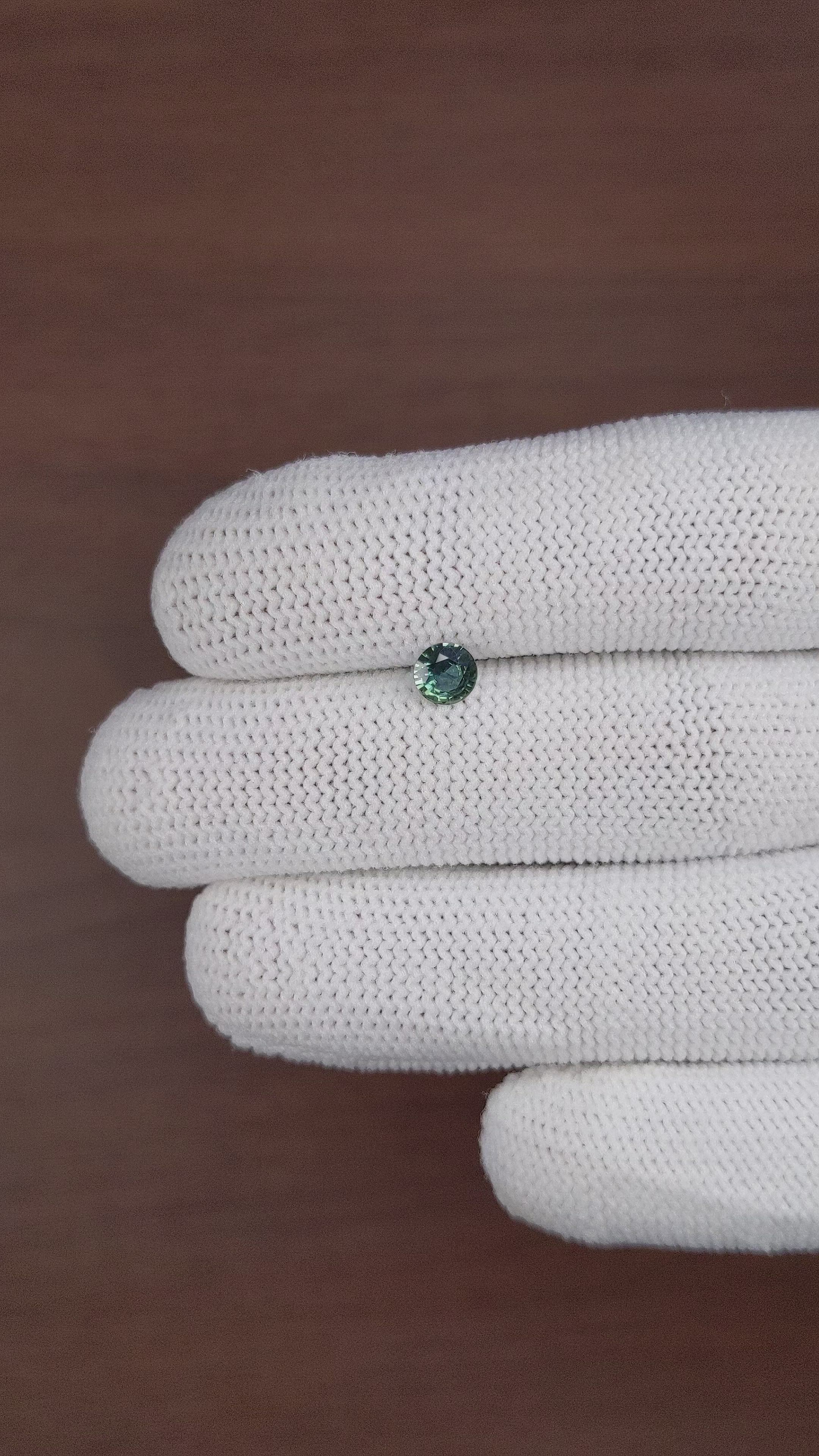 0.45 Ct. Bluish Green Sapphire from Madagascar Size Video