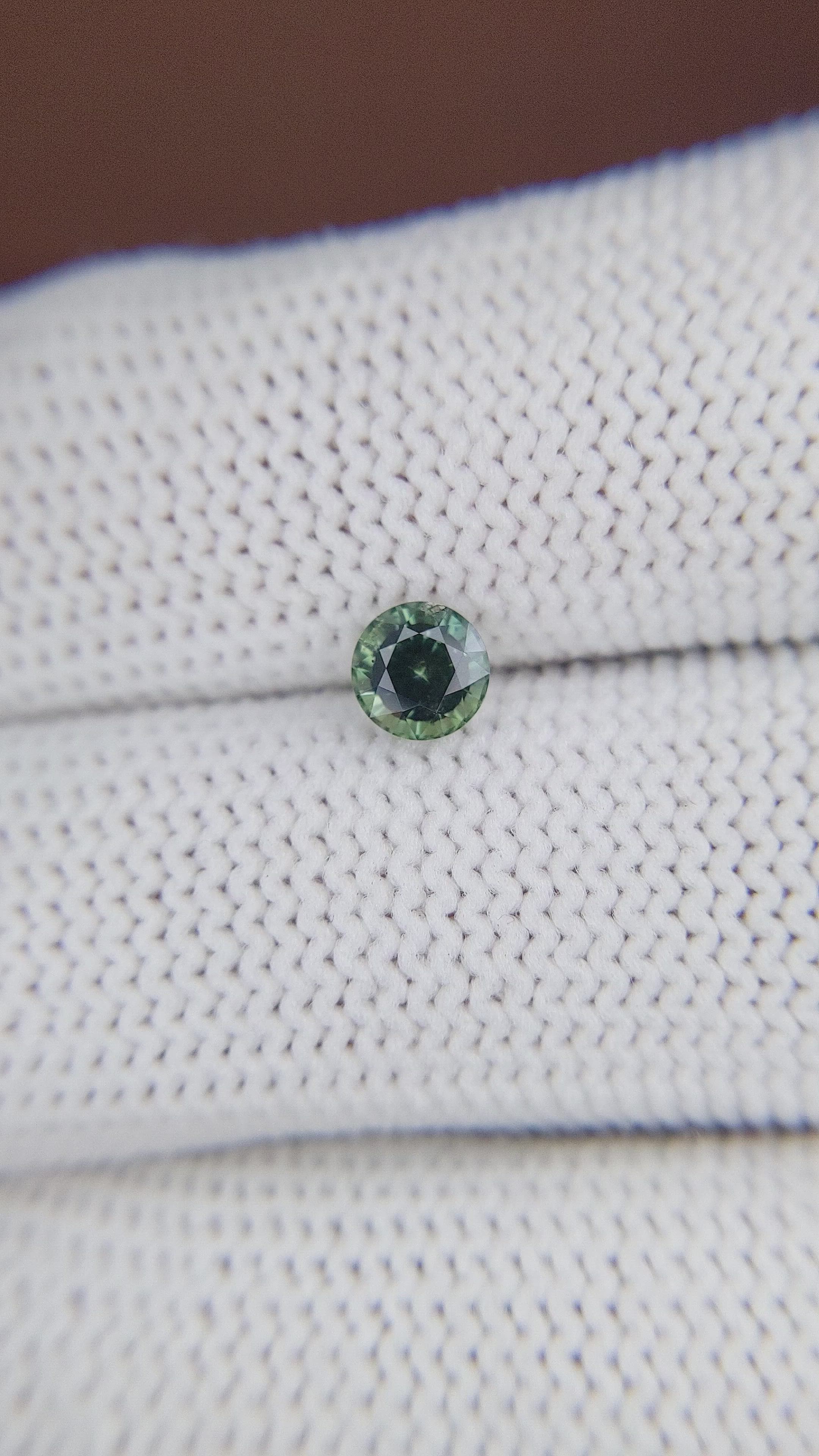 0.78 Ct. Bluish Green Sapphire from Madagascar Size Video