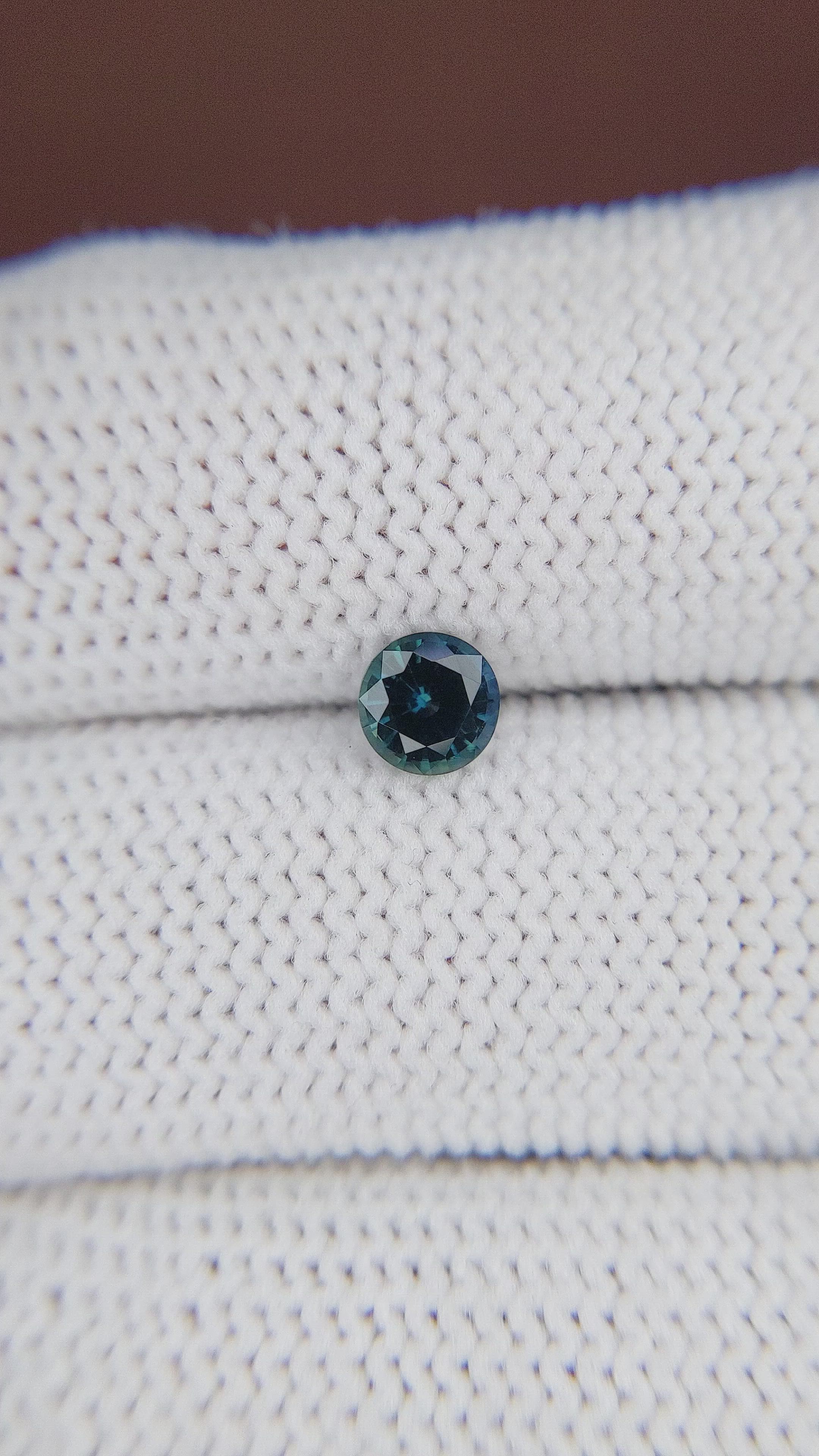 0.66 Ct. Greenish Blue Sapphire from Madagascar Size Video