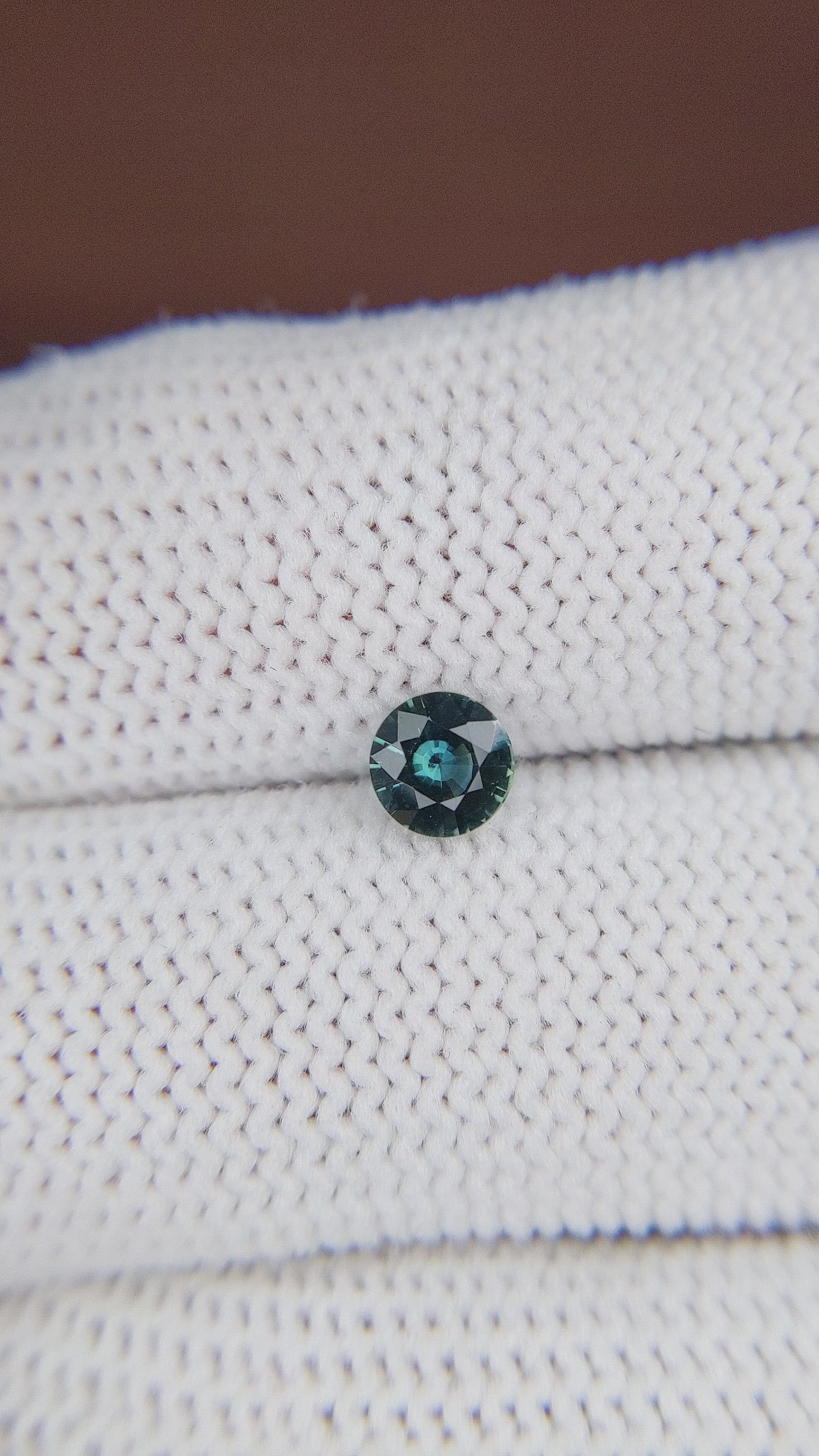 0.55 Ct. Bluish Green Sapphire from Madagascar Size Video