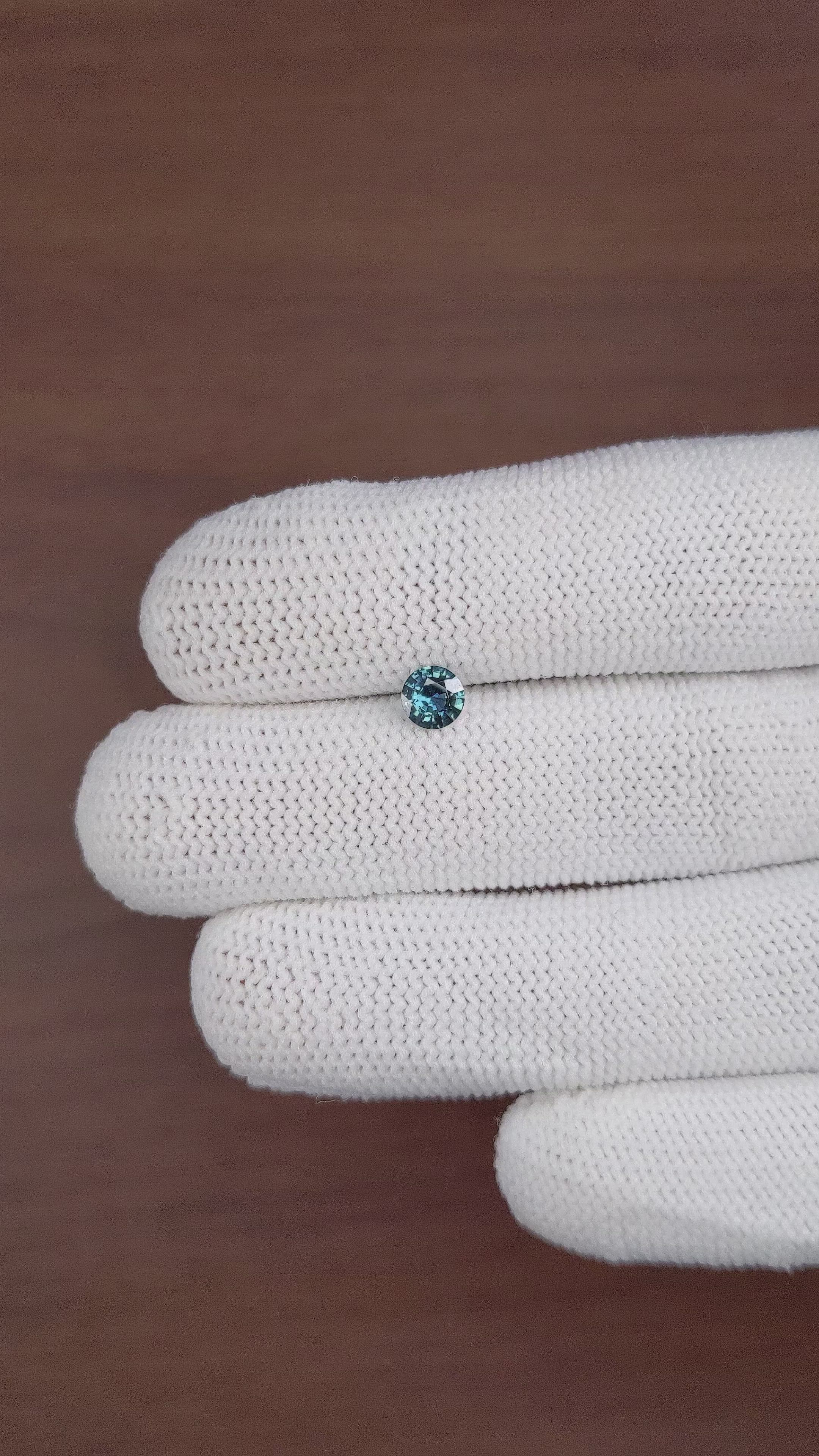 0.55 Ct. Bluish Green Sapphire from Madagascar Size Video
