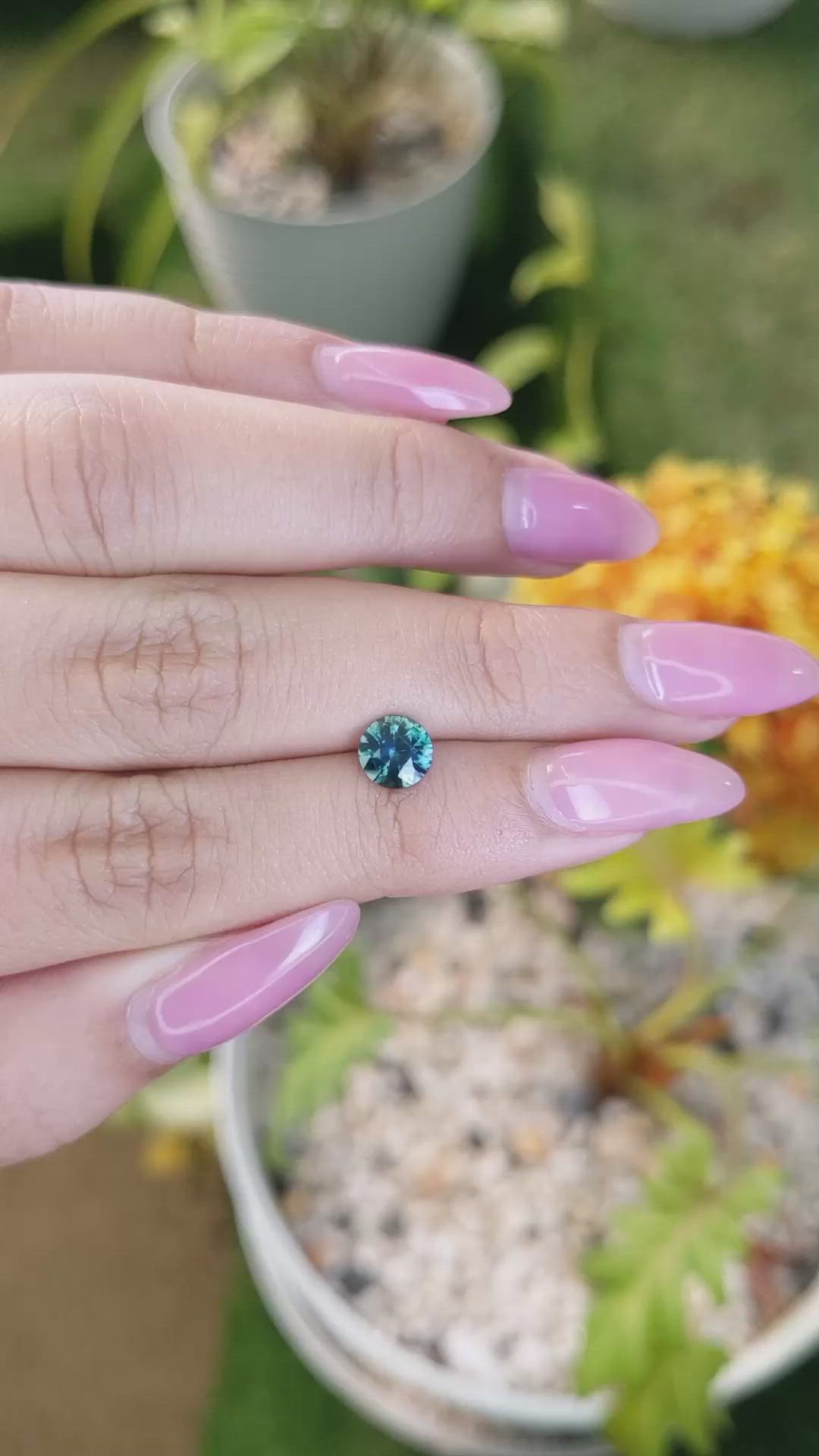 1.04 Ct. Bluish Green Sapphire from Madagascar Size Video