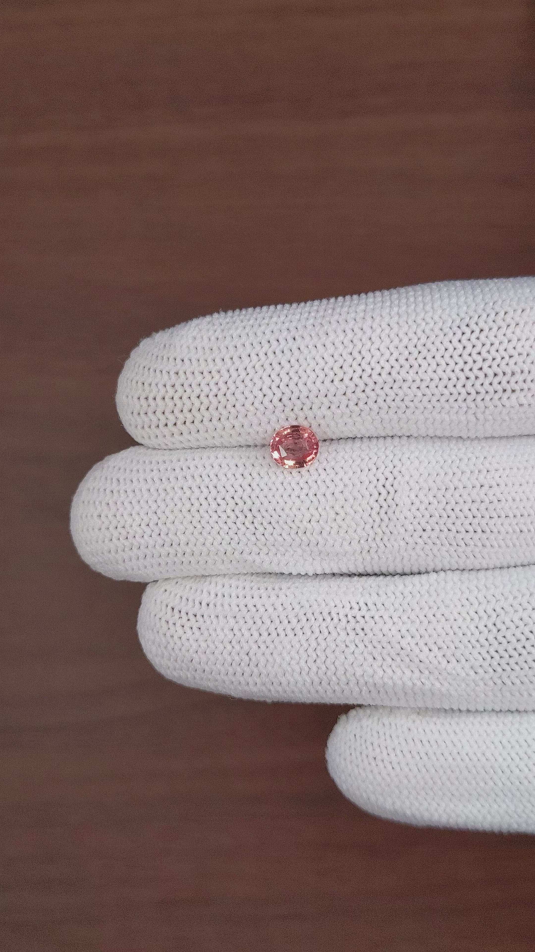 0.75 Ct. Pinkish Brown Sapphire from Madagascar Size Video