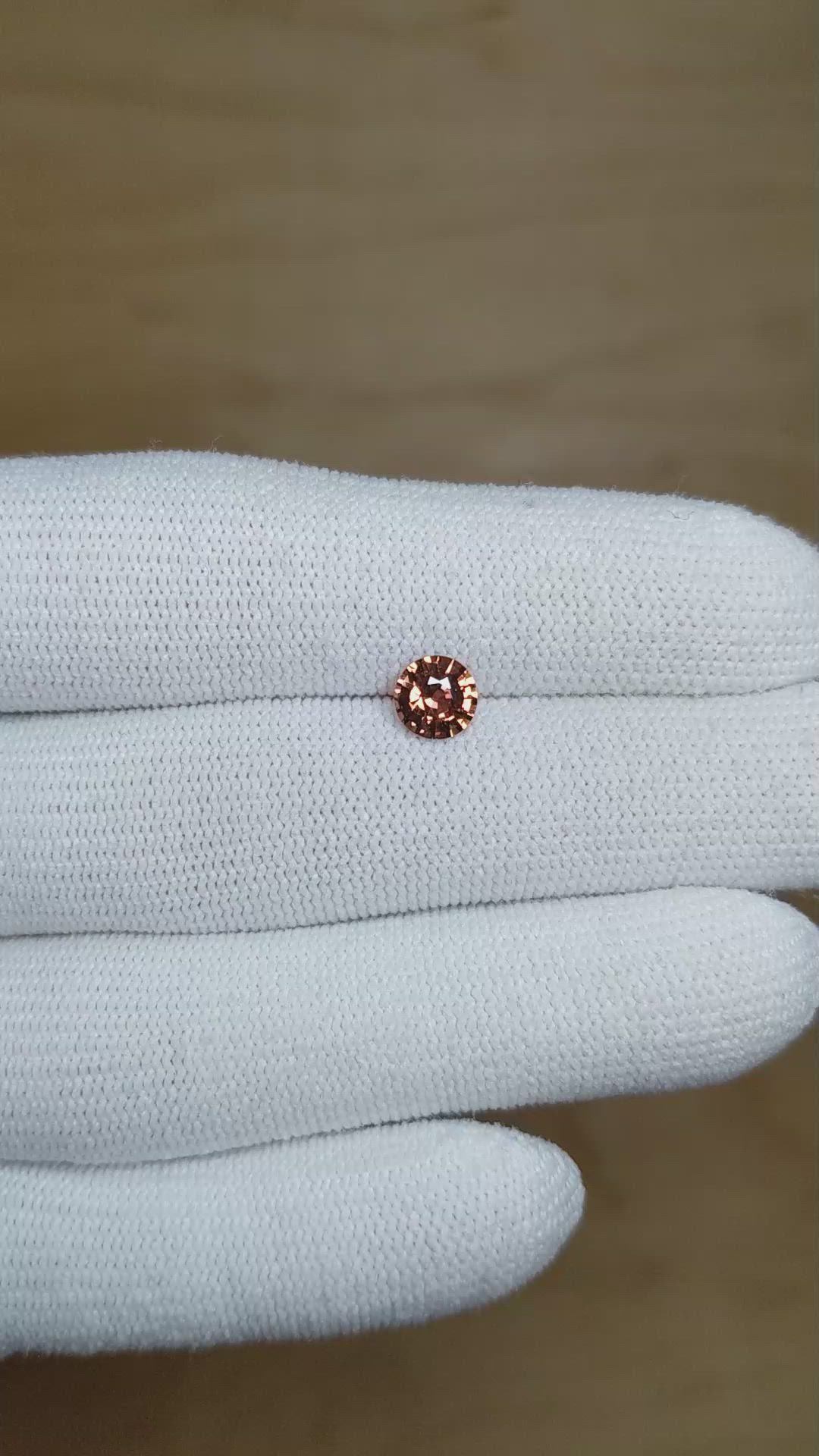 0.95 Ct. Orangish Brown Sapphire from Madagascar Size Video