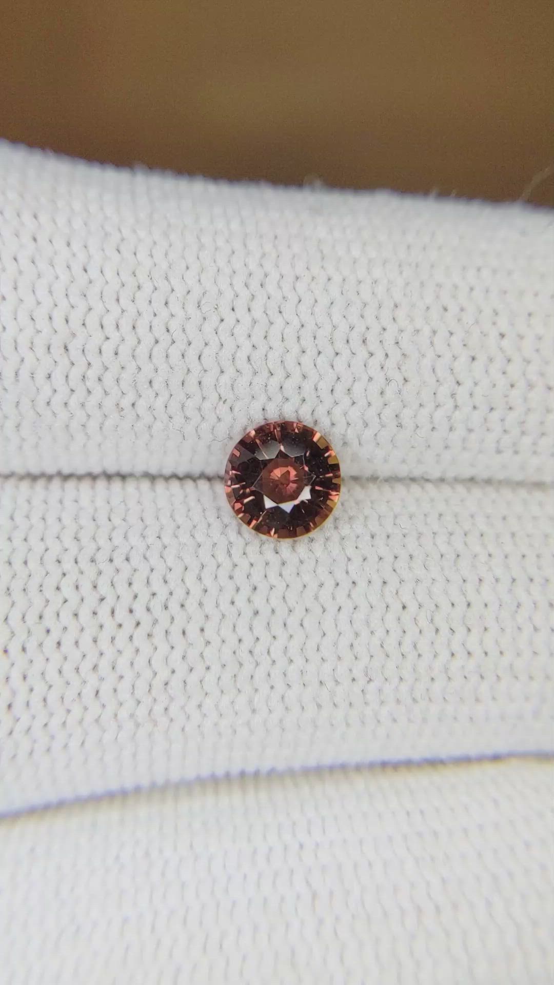 0.95 Ct. Orangish Brown Sapphire from Madagascar Size Video