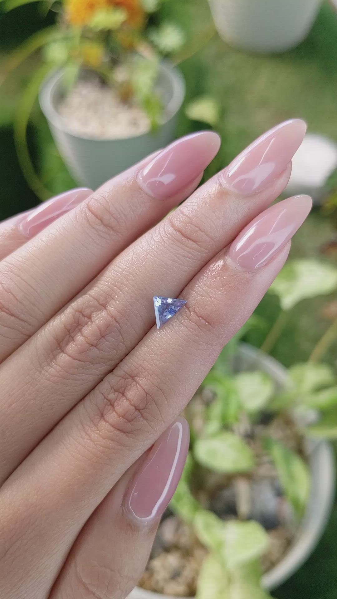0.61 Ct. Violet Sapphire from Ceylon (Sri Lanka) Size Video