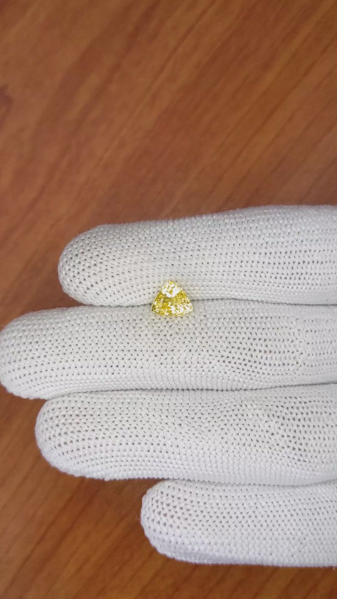 1.53 Ct. Orangish Yellow Sapphire from Ceylon (Sri Lanka) Size Video