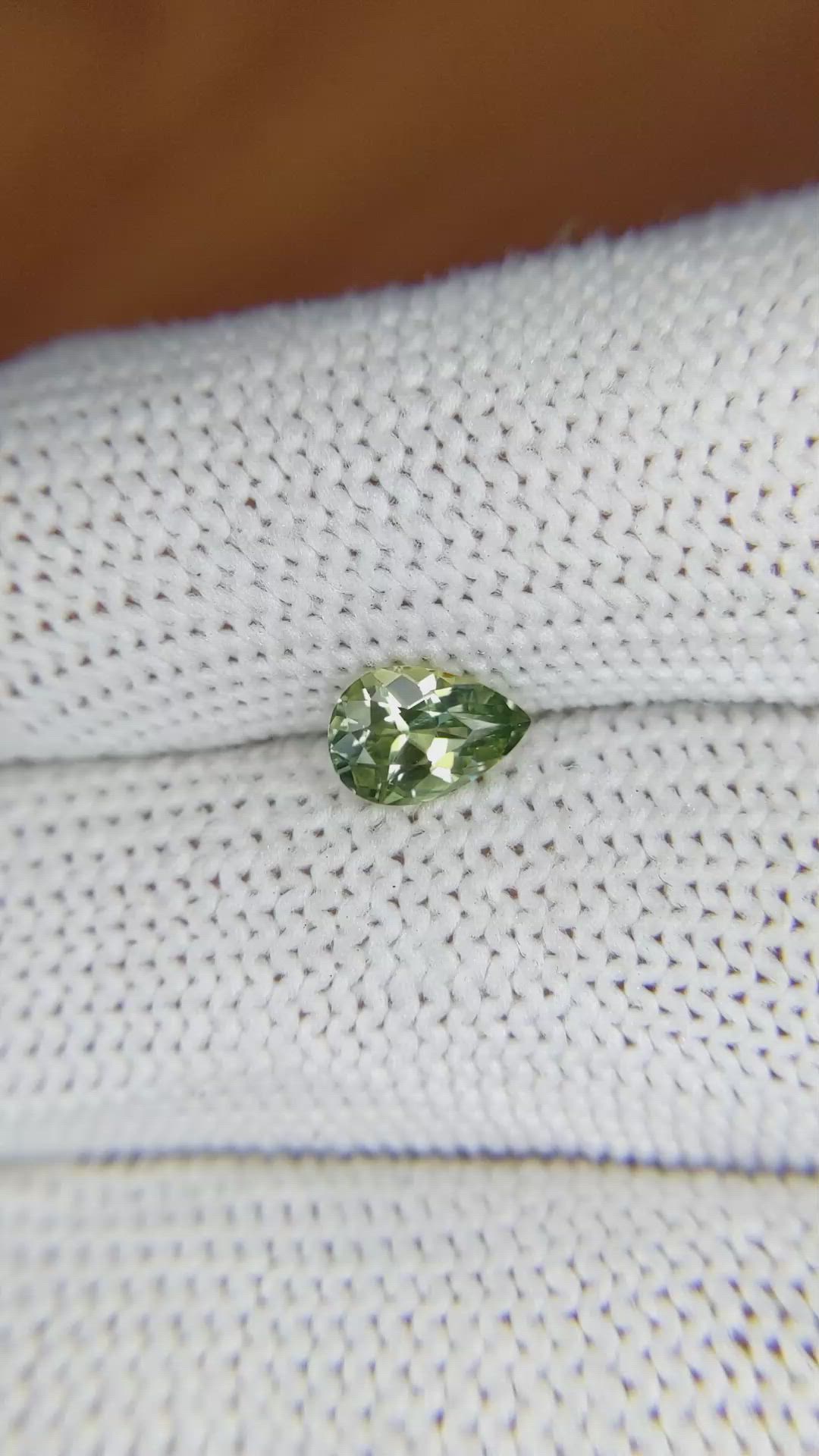 0.88 Ct. Yellowish Green Sapphire from Madagascar Size Video