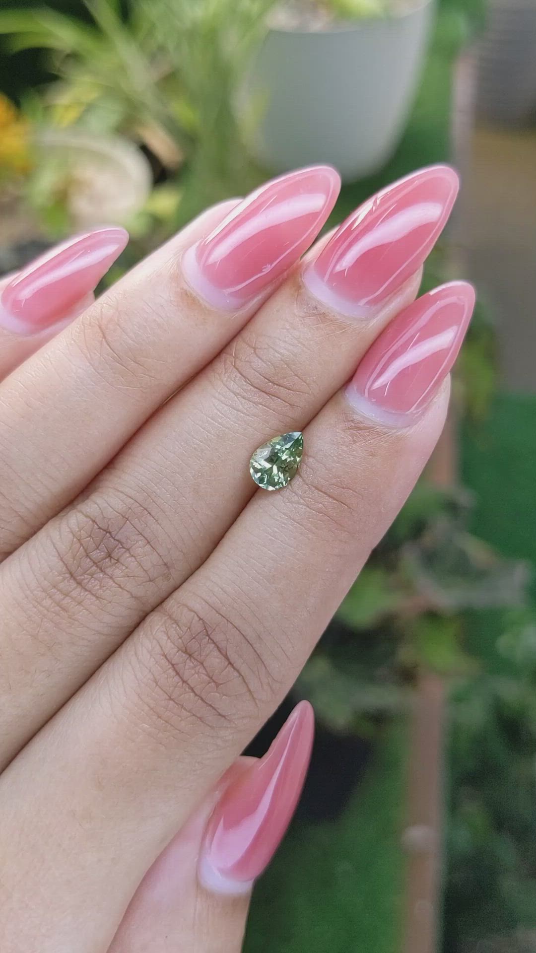 0.88 Ct. Yellowish Green Sapphire from Madagascar Size Video