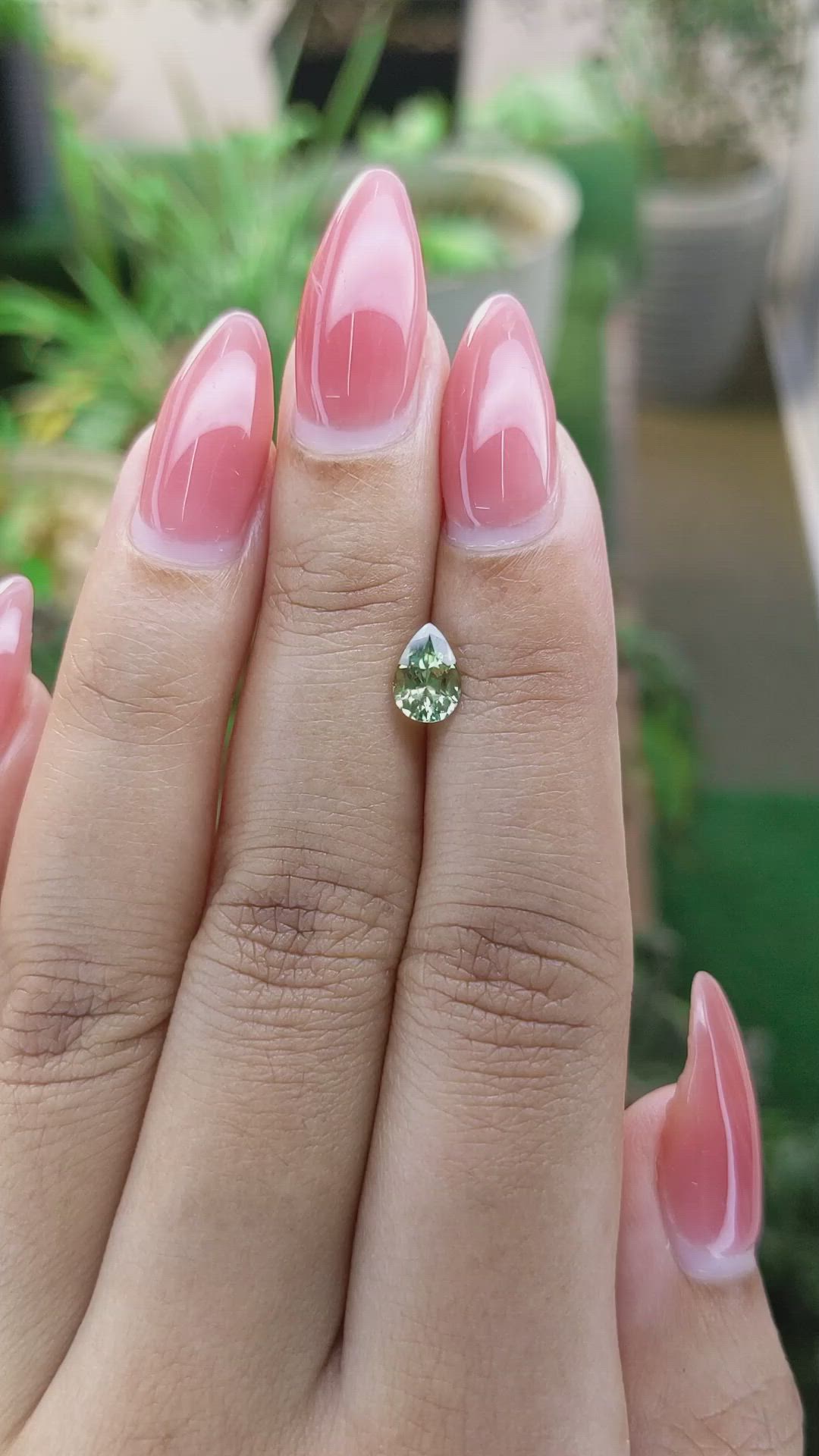 0.88 Ct. Yellowish Green Sapphire from Madagascar Size Video