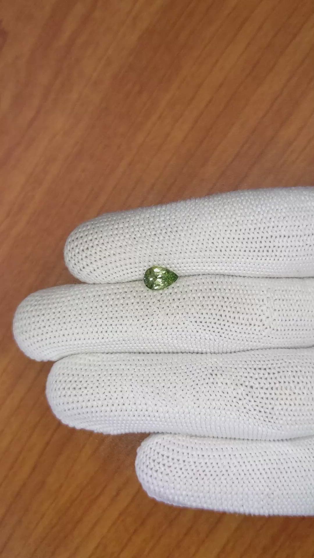 0.88 Ct. Yellowish Green Sapphire from Madagascar Size Video