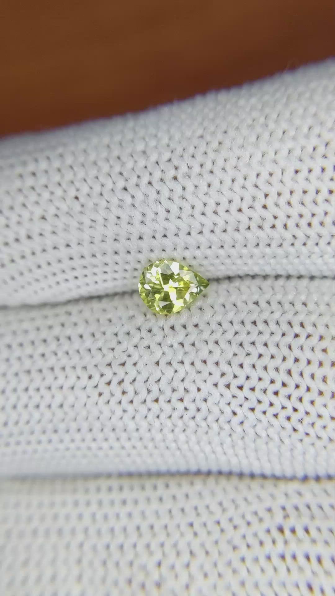 0.52 Ct. Greenish Yellow Sapphire from Madagascar Size Video