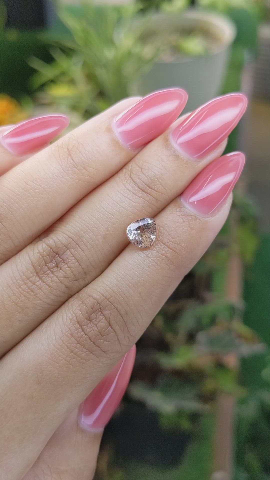 1.57 Ct. Peach Sapphire from Ceylon (Sri Lanka) Size Video