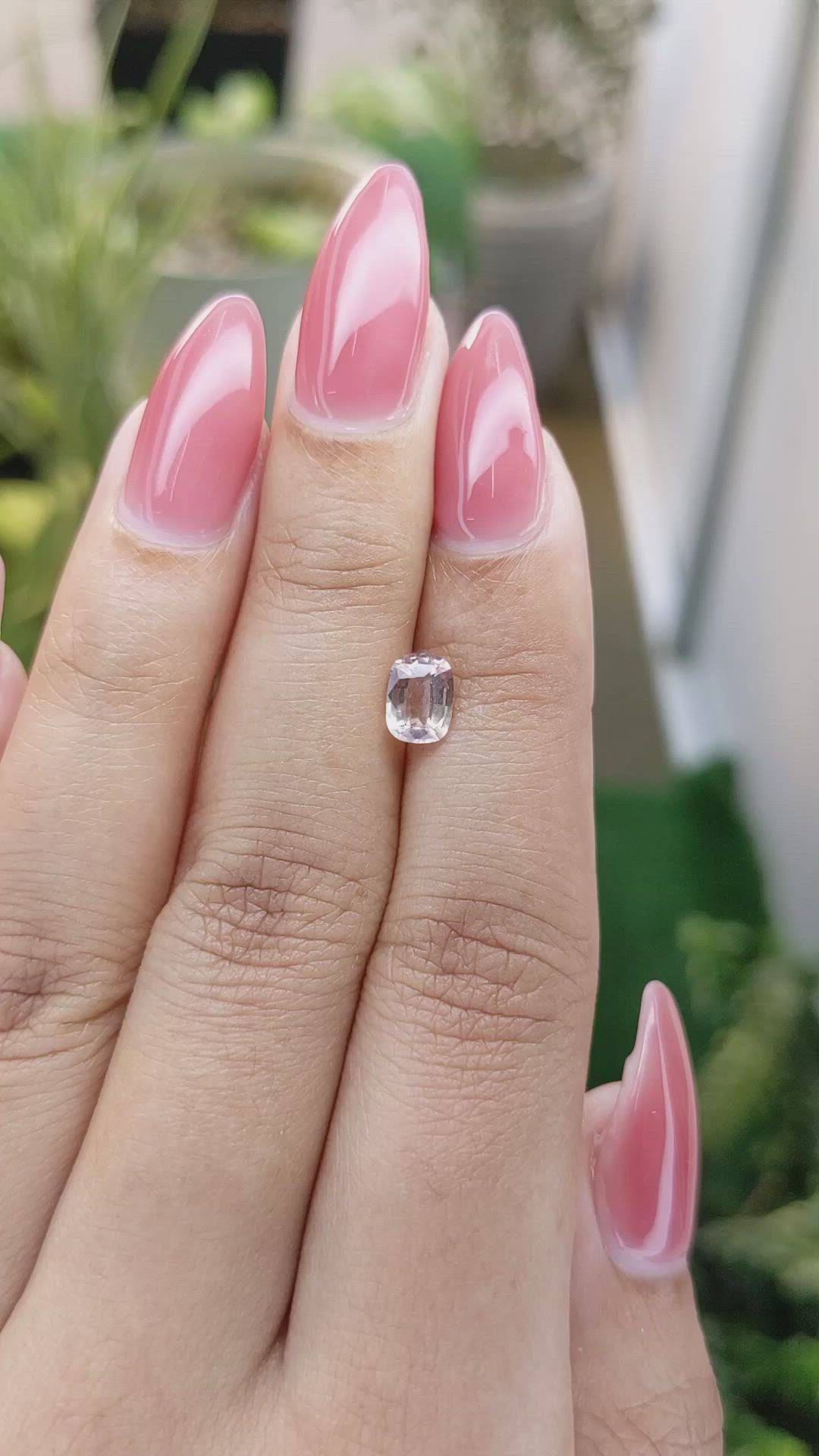 0.90 Ct. Peach Sapphire from Ceylon (Sri Lanka) Size Video