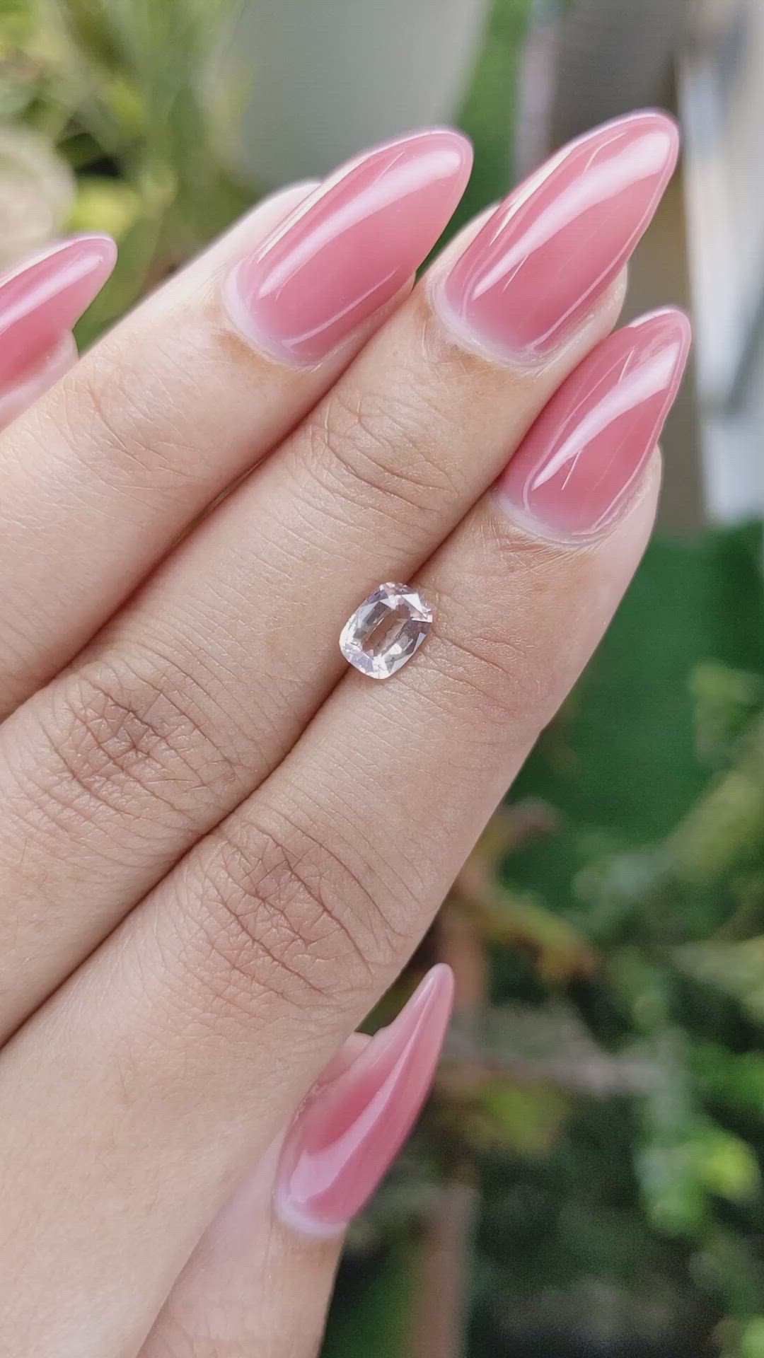 0.90 Ct. Peach Sapphire from Ceylon (Sri Lanka) Size Video