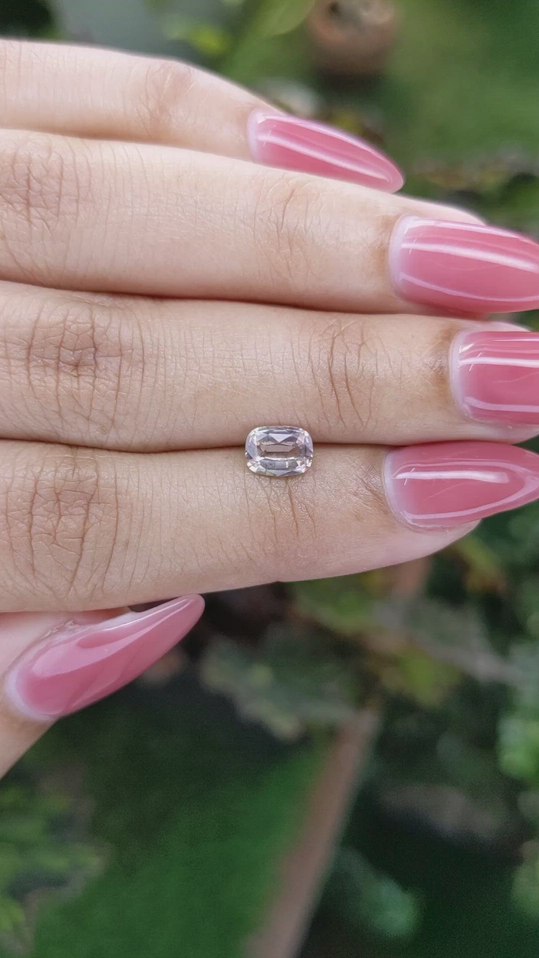 0.90 Ct. Peach Sapphire from Ceylon (Sri Lanka) Size Video