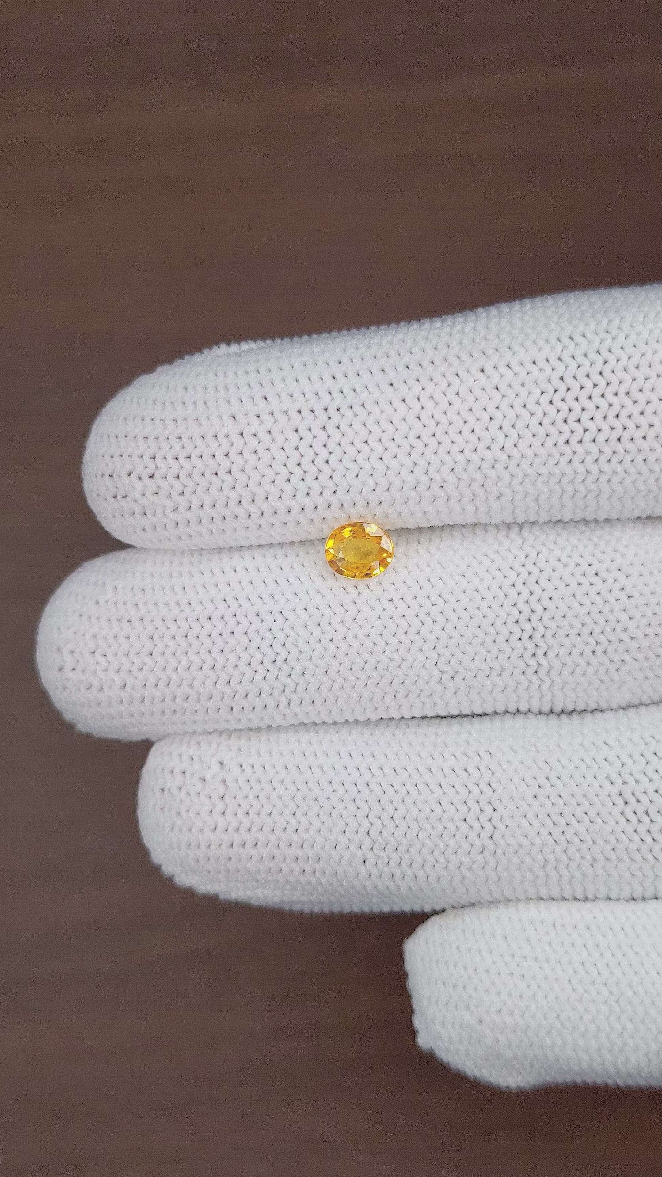 0.63 Ct. Yellow Sapphire from Madagascar Size Video