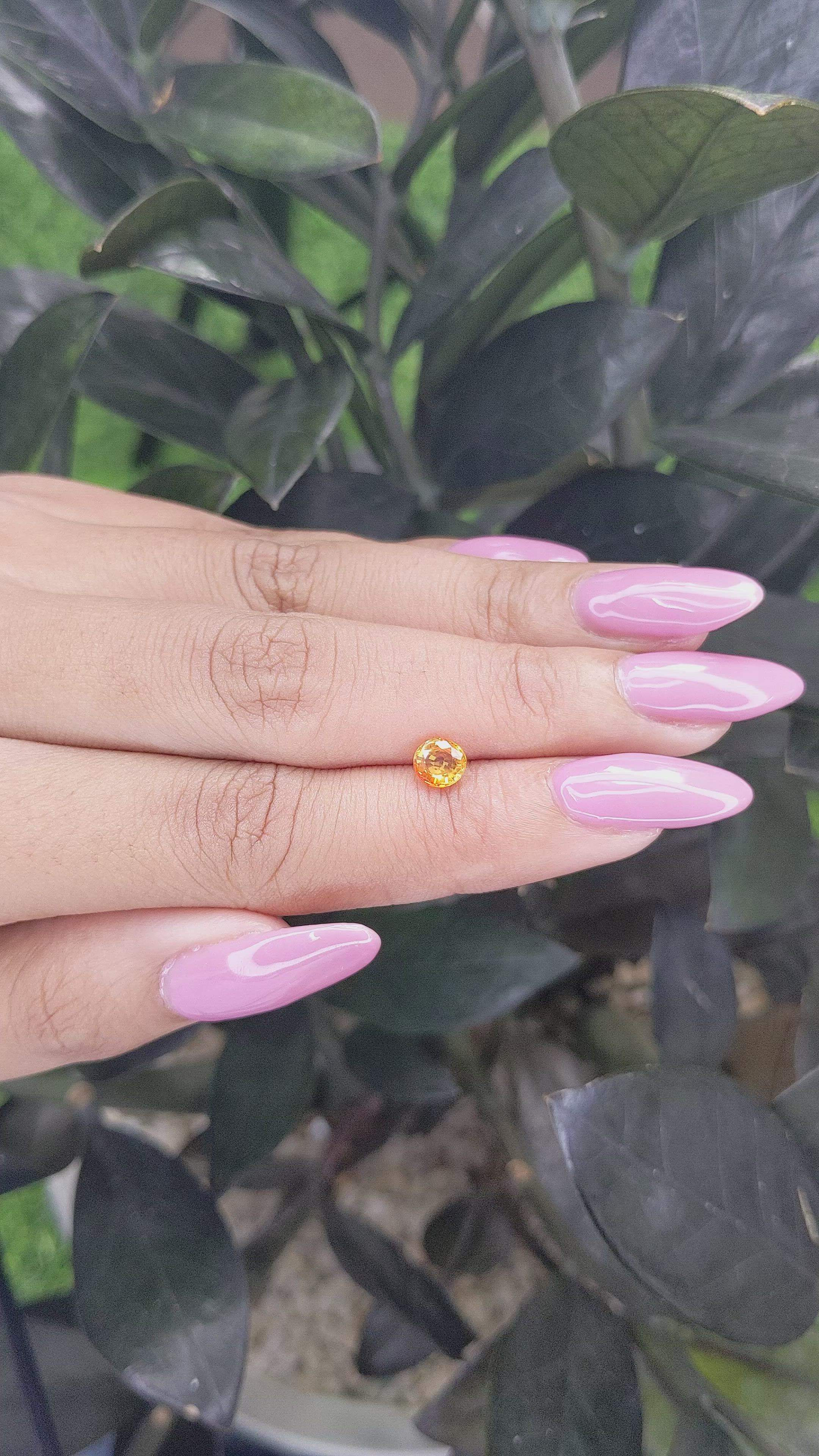 0.80 Ct. Orangish Yellow Sapphire from Madagascar Size Video