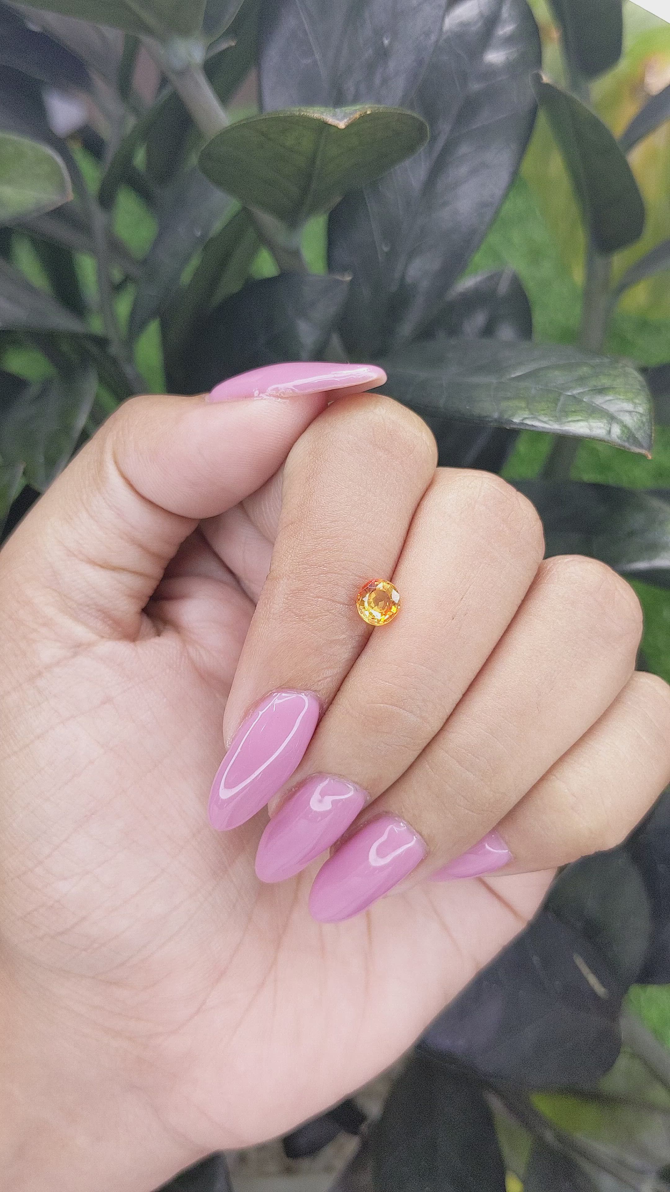 0.80 Ct. Orangish Yellow Sapphire from Madagascar Size Video