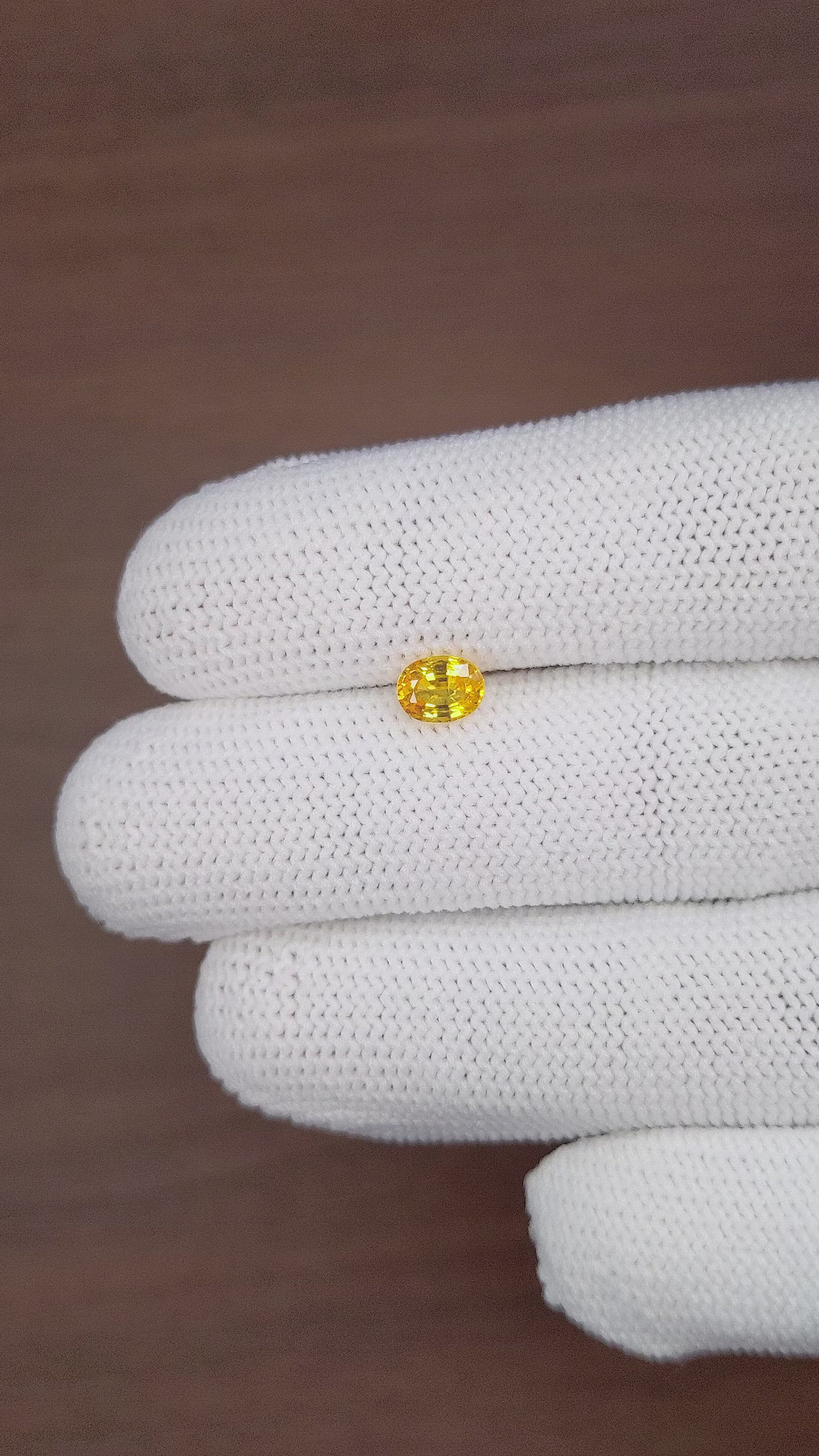 0.82 Ct. Yellow Sapphire from Madagascar Size Video