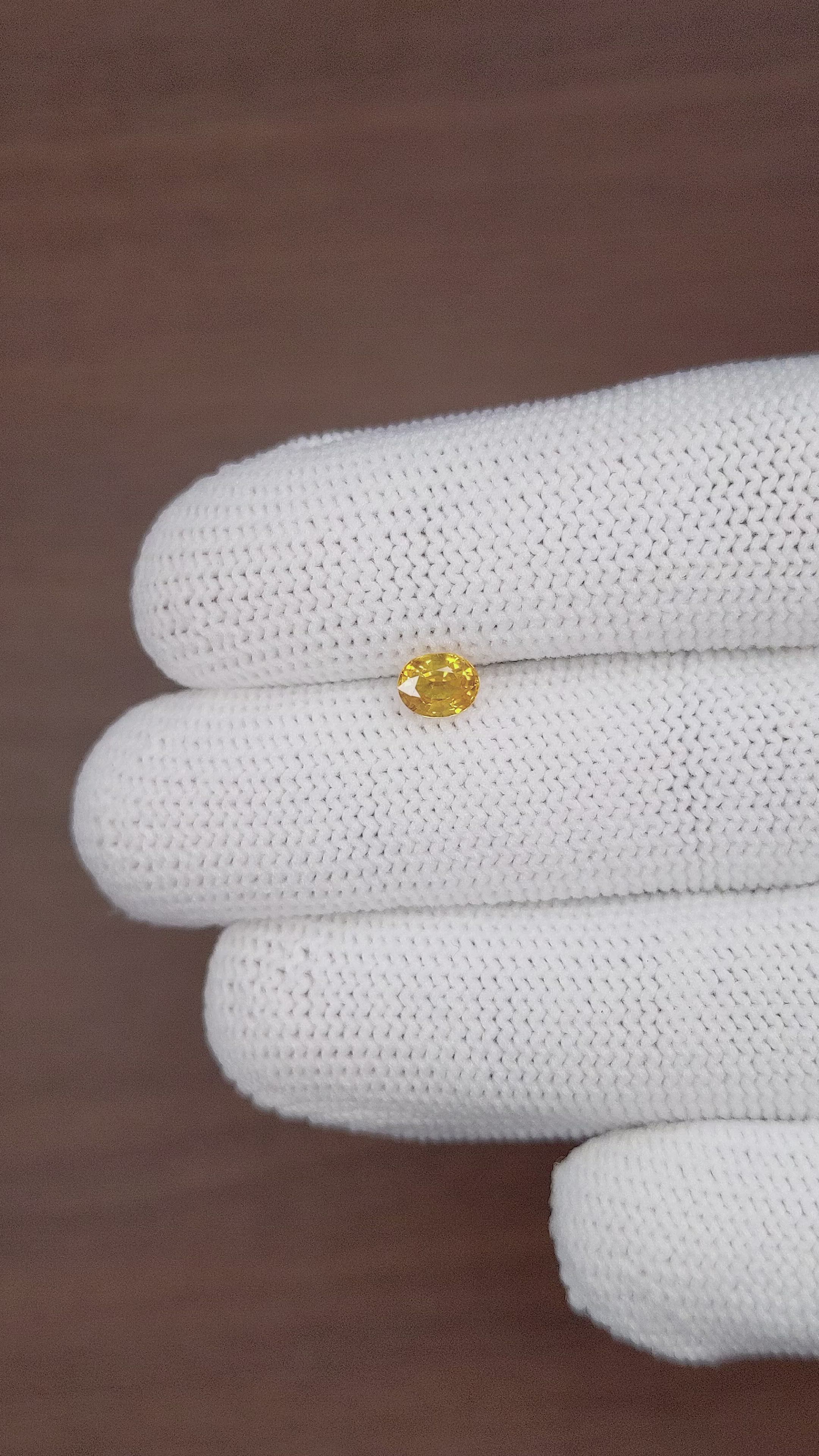 0.68 Ct. Yellow Sapphire from Madagascar Size Video