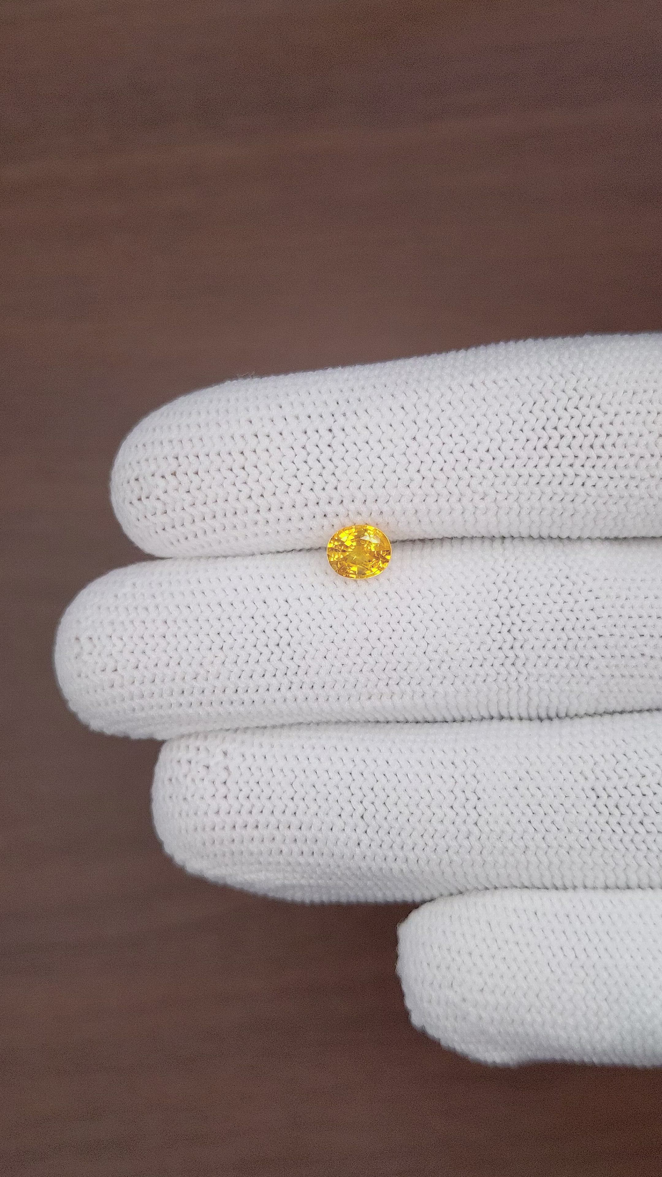 0.91 Ct. Yellow Sapphire from Madagascar Size Video