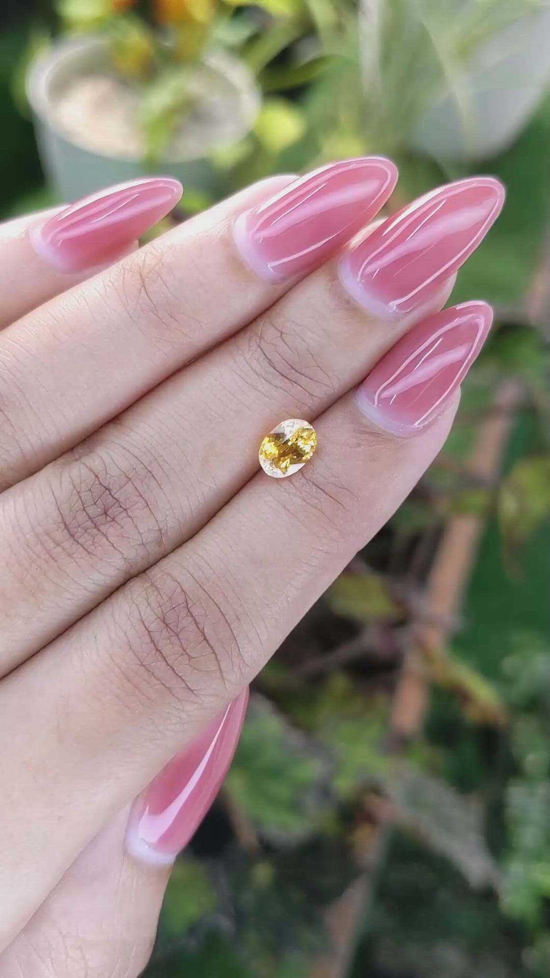 1.12 Ct. Orangish Yellow Sapphire from Ceylon (Sri Lanka) Size Video