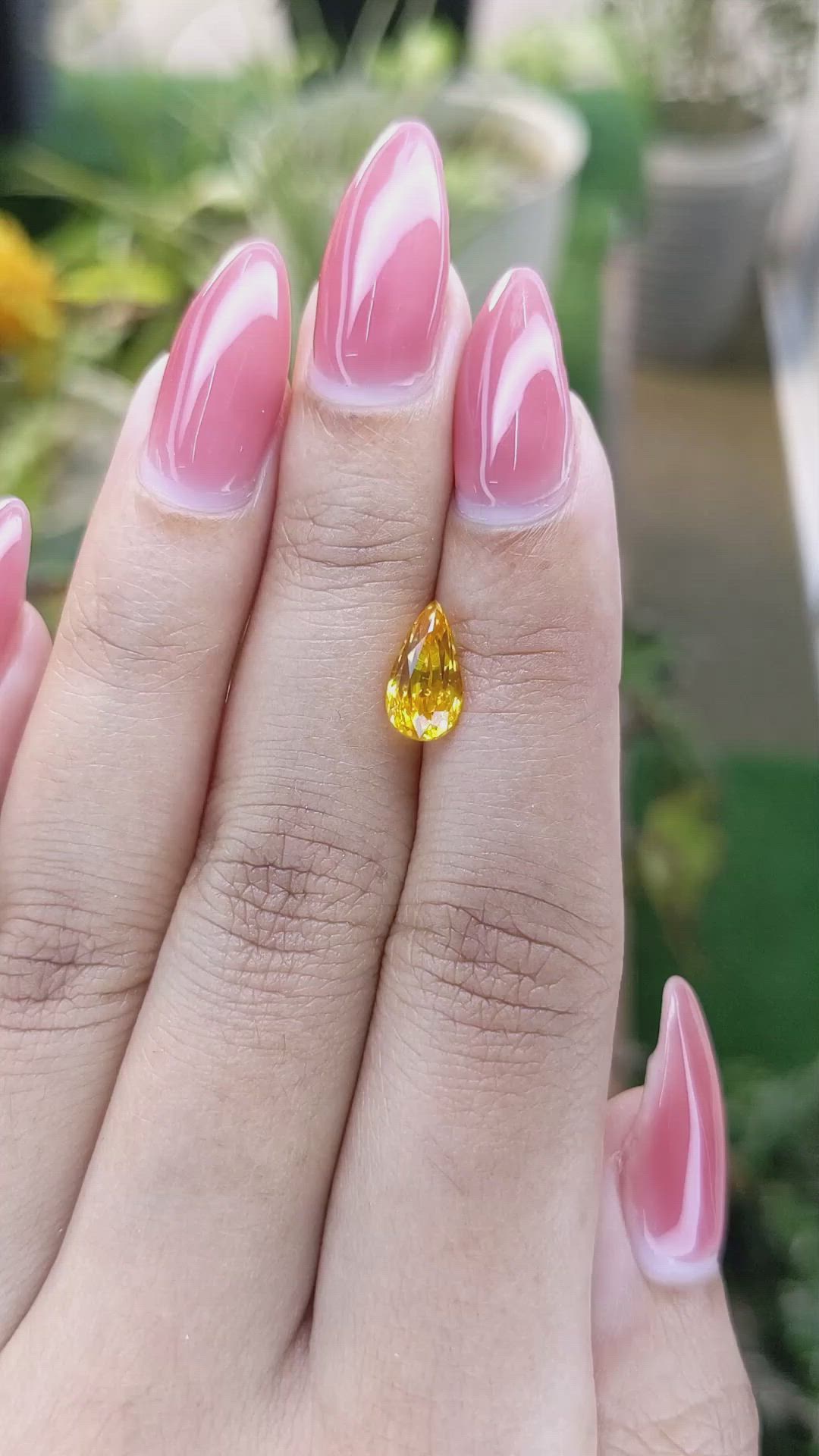 2.00 Ct. Yellowish Orange Sapphire from Ceylon (Sri Lanka) Size Video