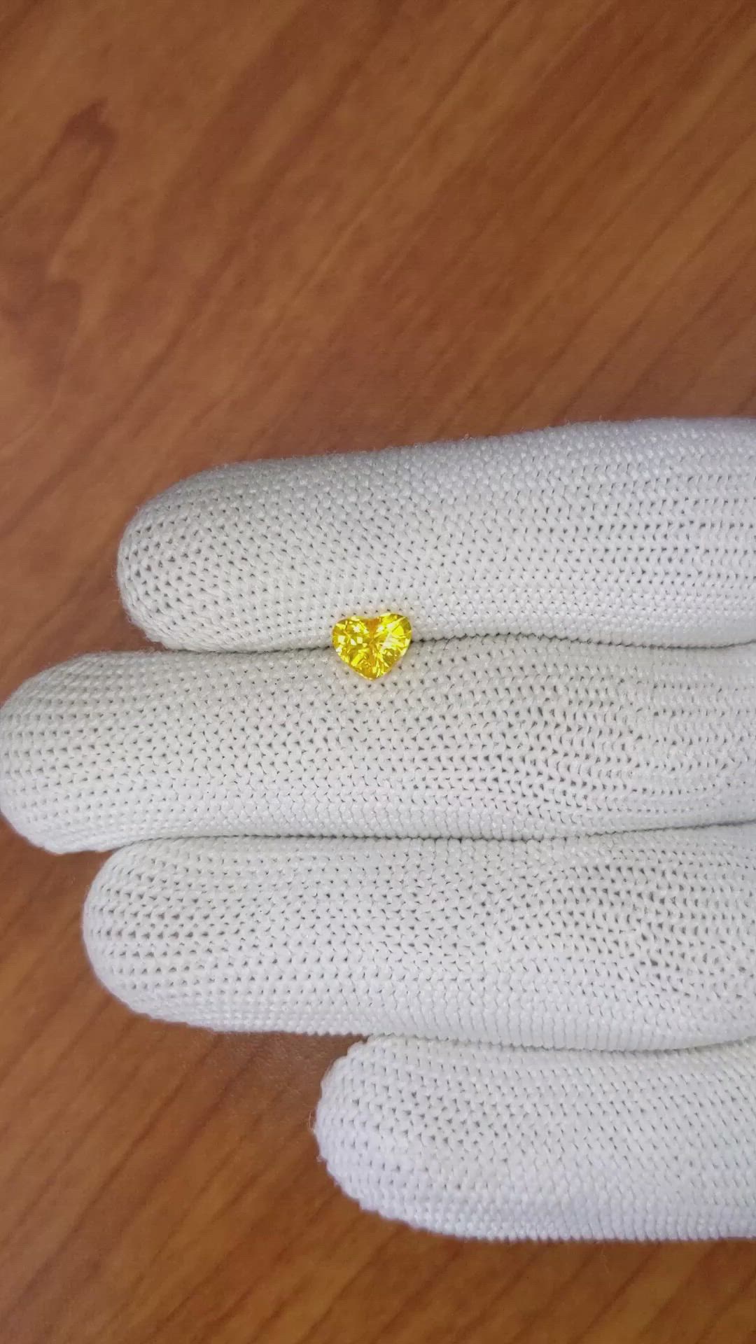 0.97 Ct. Orangish Yellow Sapphire from Ceylon (Sri Lanka) Size Video