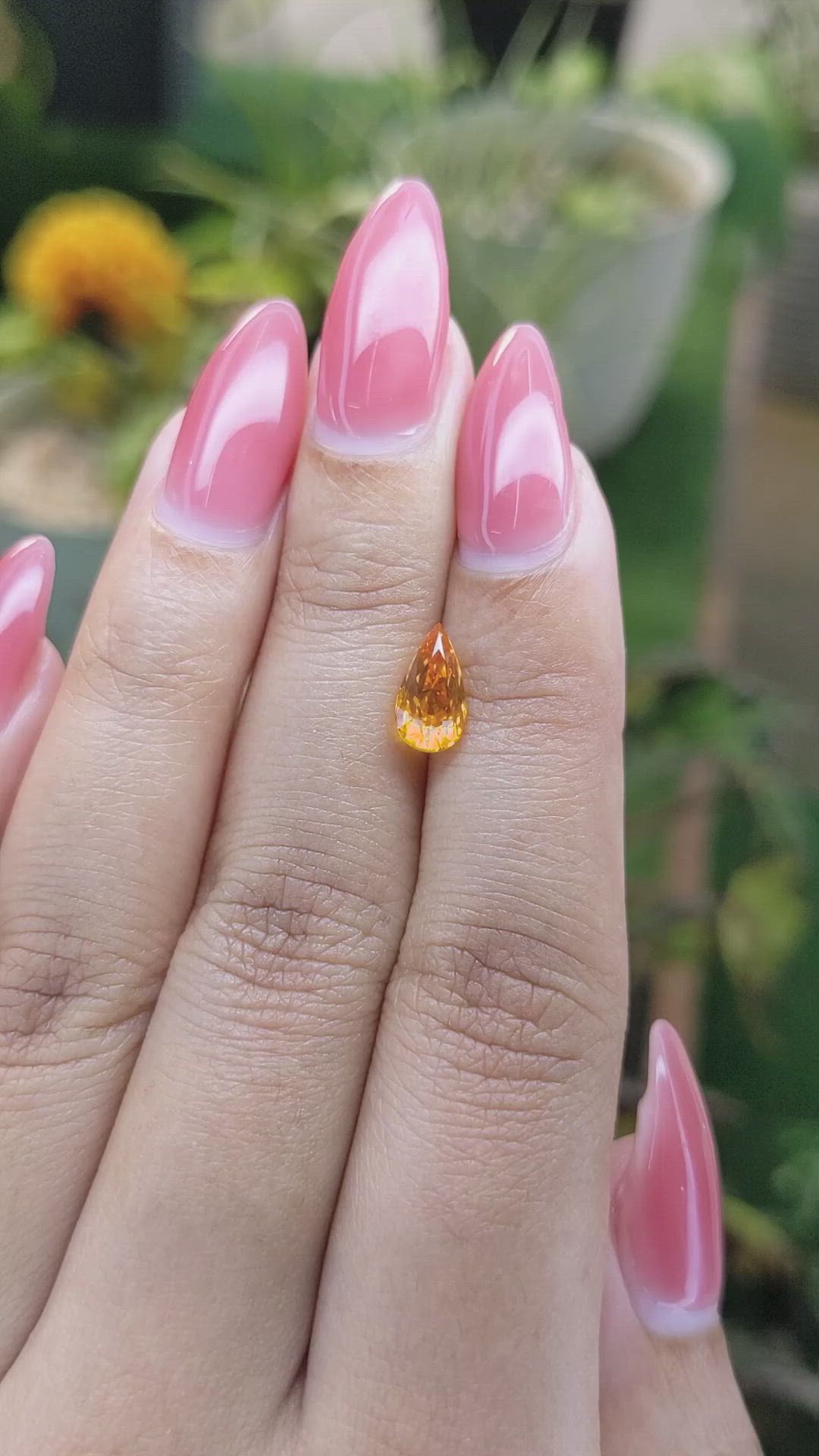 1.62 Ct. Yellowish Orange Sapphire from Ceylon (Sri Lanka) Size Video