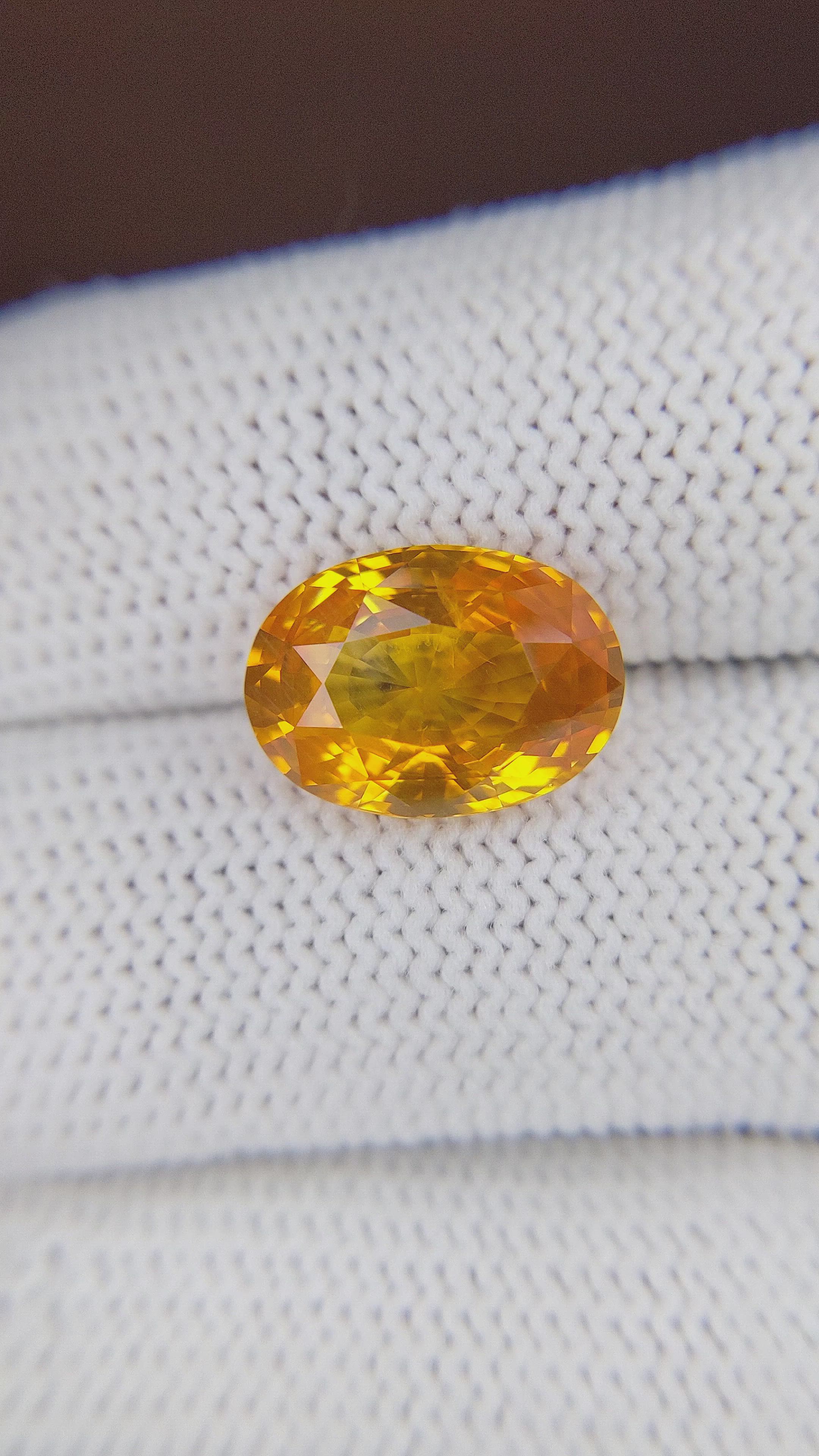 7.09 Ct. Yellowish Orange Sapphire from Ceylon (Sri Lanka) Size Video