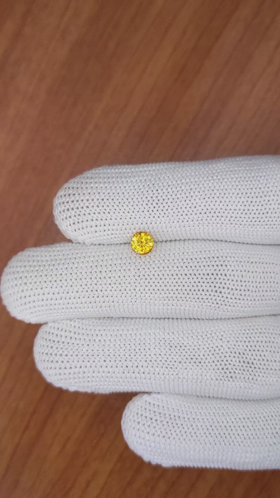 0.58 Ct. Yellowish Orange Sapphire from Ceylon (Sri Lanka) Size Video
