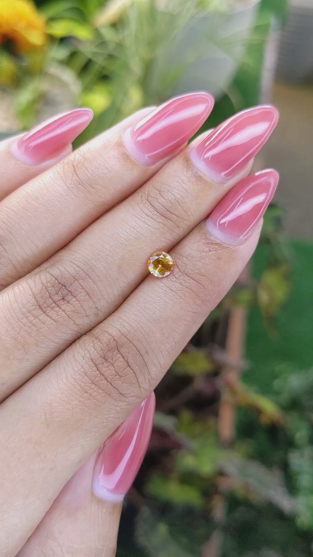 0.58 Ct. Yellowish Orange Sapphire from Ceylon (Sri Lanka) Size Video