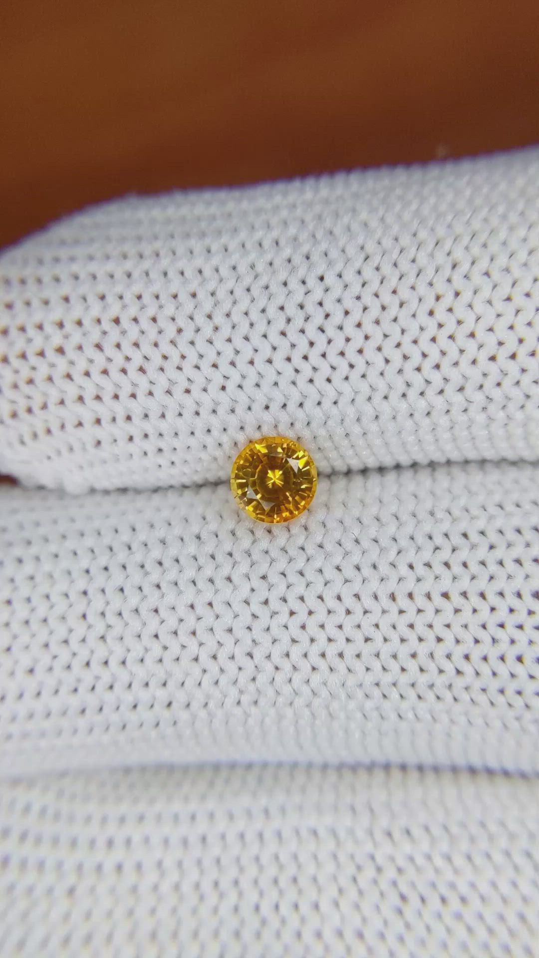 0.58 Ct. Yellowish Orange Sapphire from Ceylon (Sri Lanka) Size Video