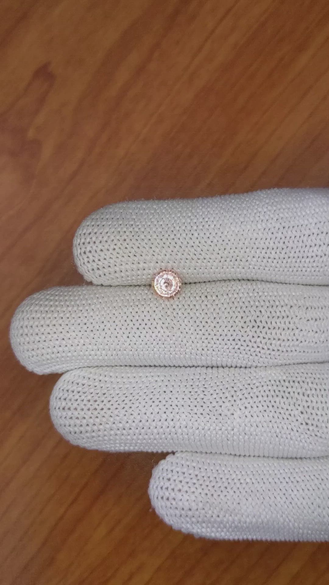 0.77 Ct. Peach Sapphire from Ceylon (Sri Lanka) Size Video