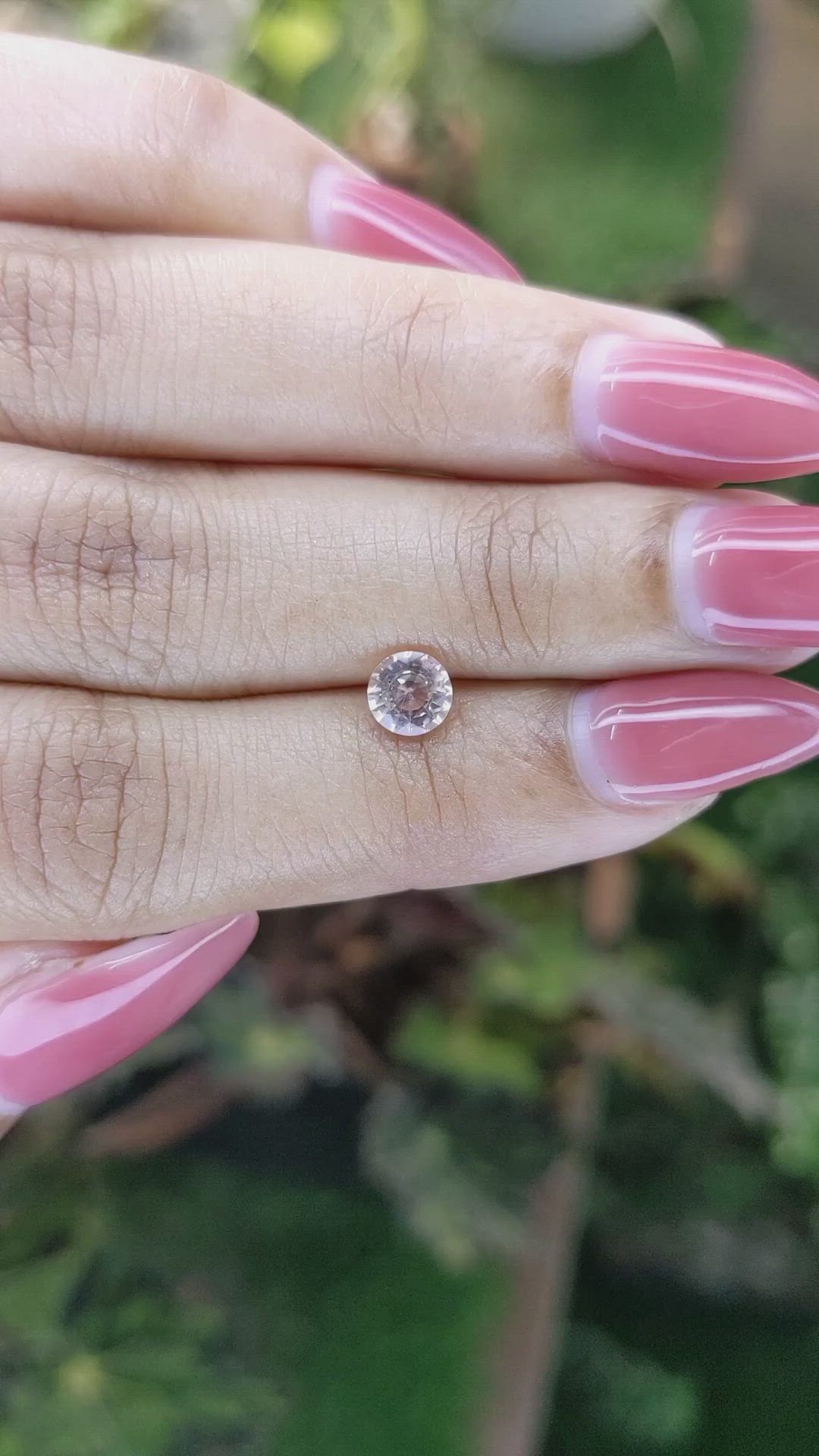 0.77 Ct. Peach Sapphire from Ceylon (Sri Lanka) Size Video