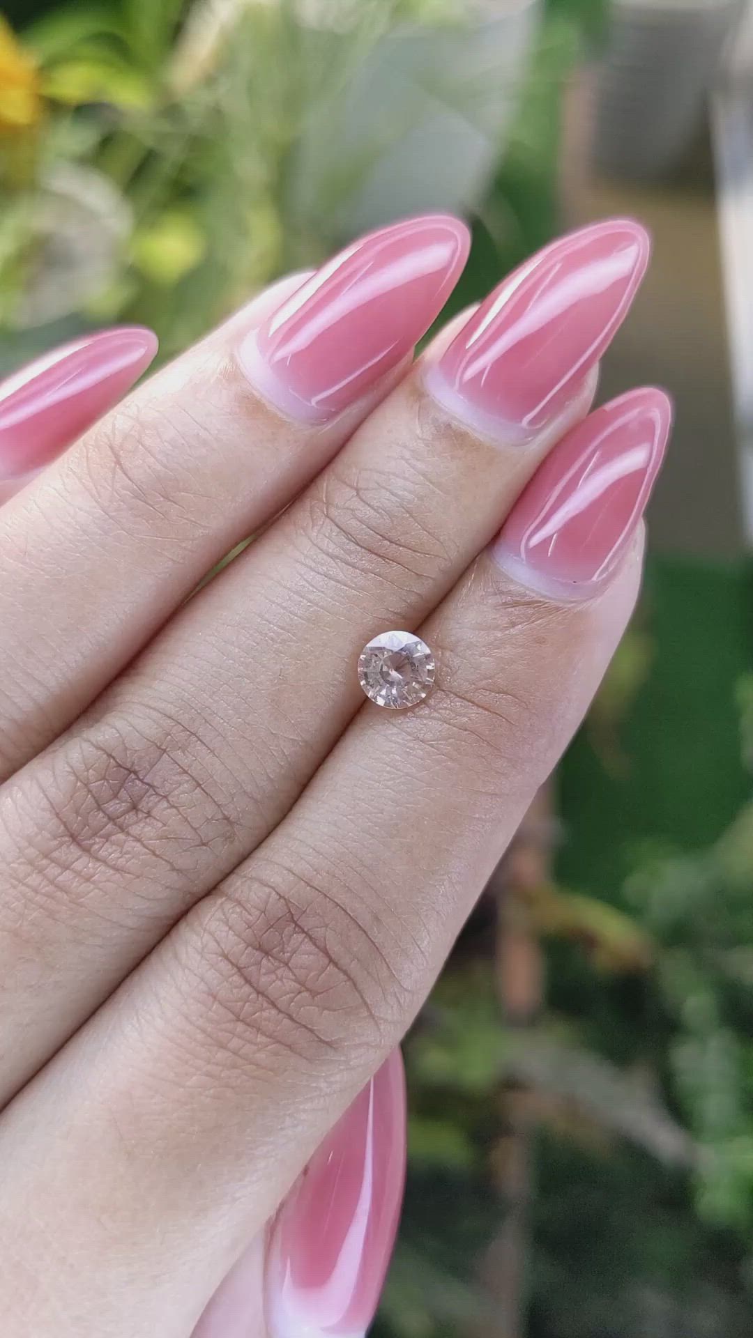 0.77 Ct. Peach Sapphire from Ceylon (Sri Lanka) Size Video