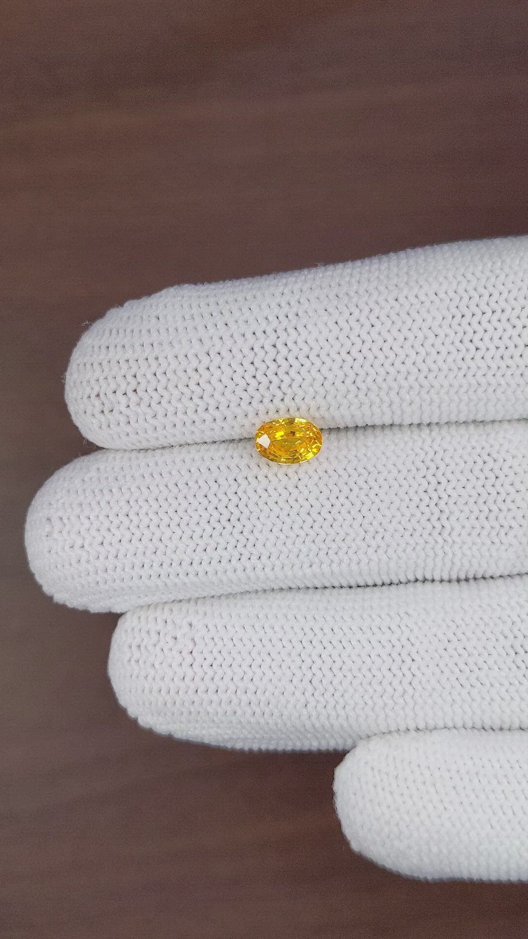 1.30 Ct. Orangish Yellow Sapphire from Ceylon (Sri Lanka) Size Video