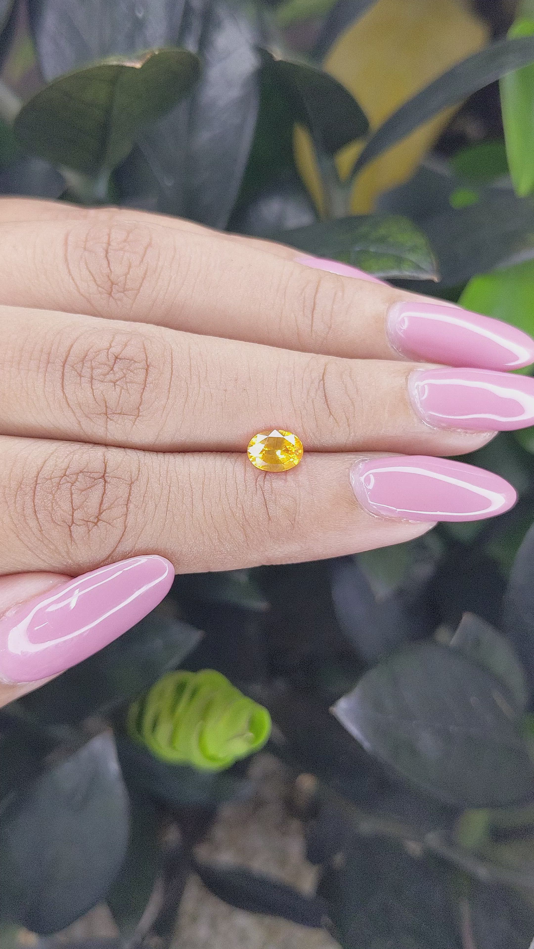 0.94 Ct. Orangish Yellow Sapphire from Ceylon (Sri Lanka) Size Video