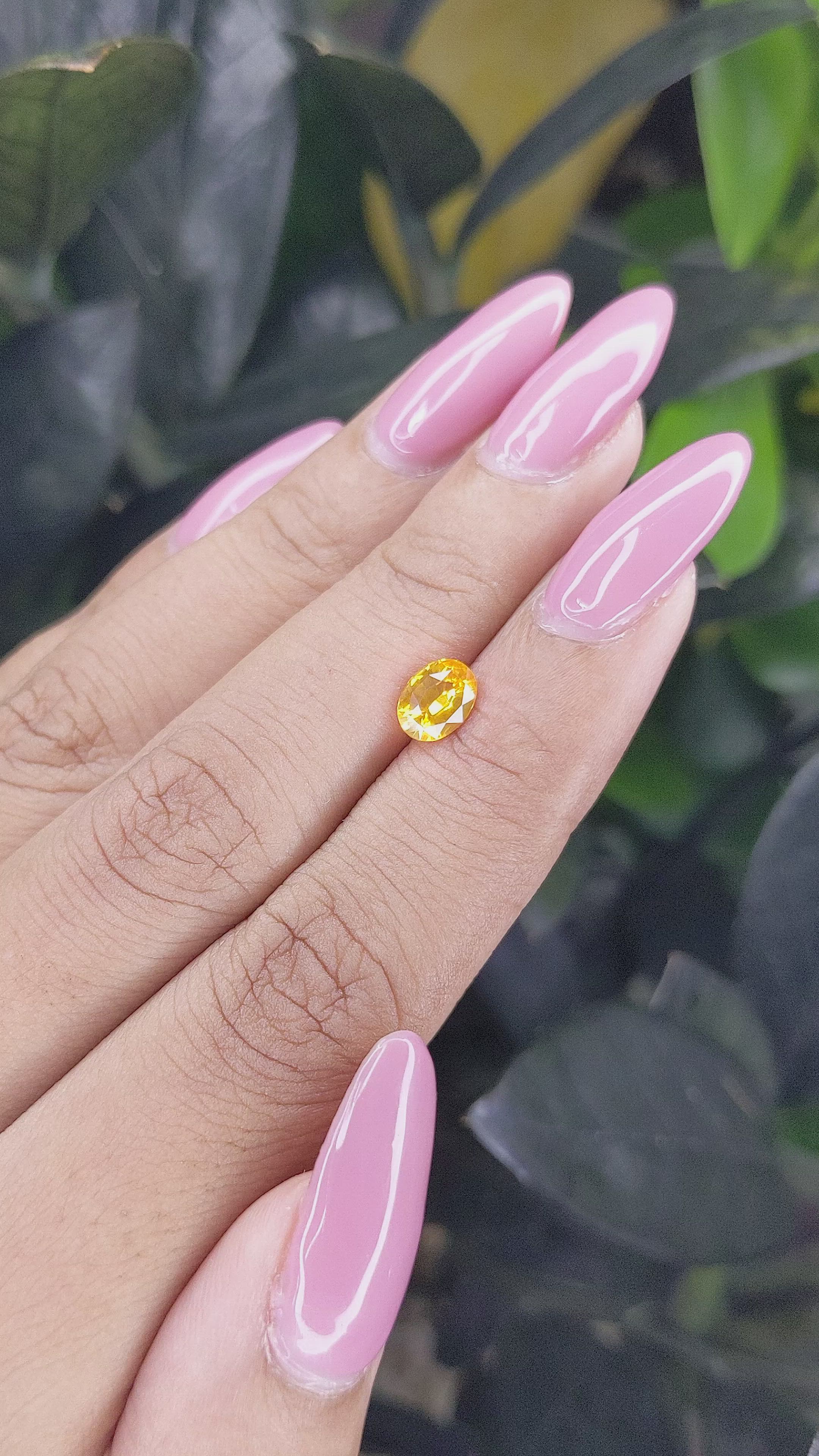 0.94 Ct. Orangish Yellow Sapphire from Ceylon (Sri Lanka) Size Video