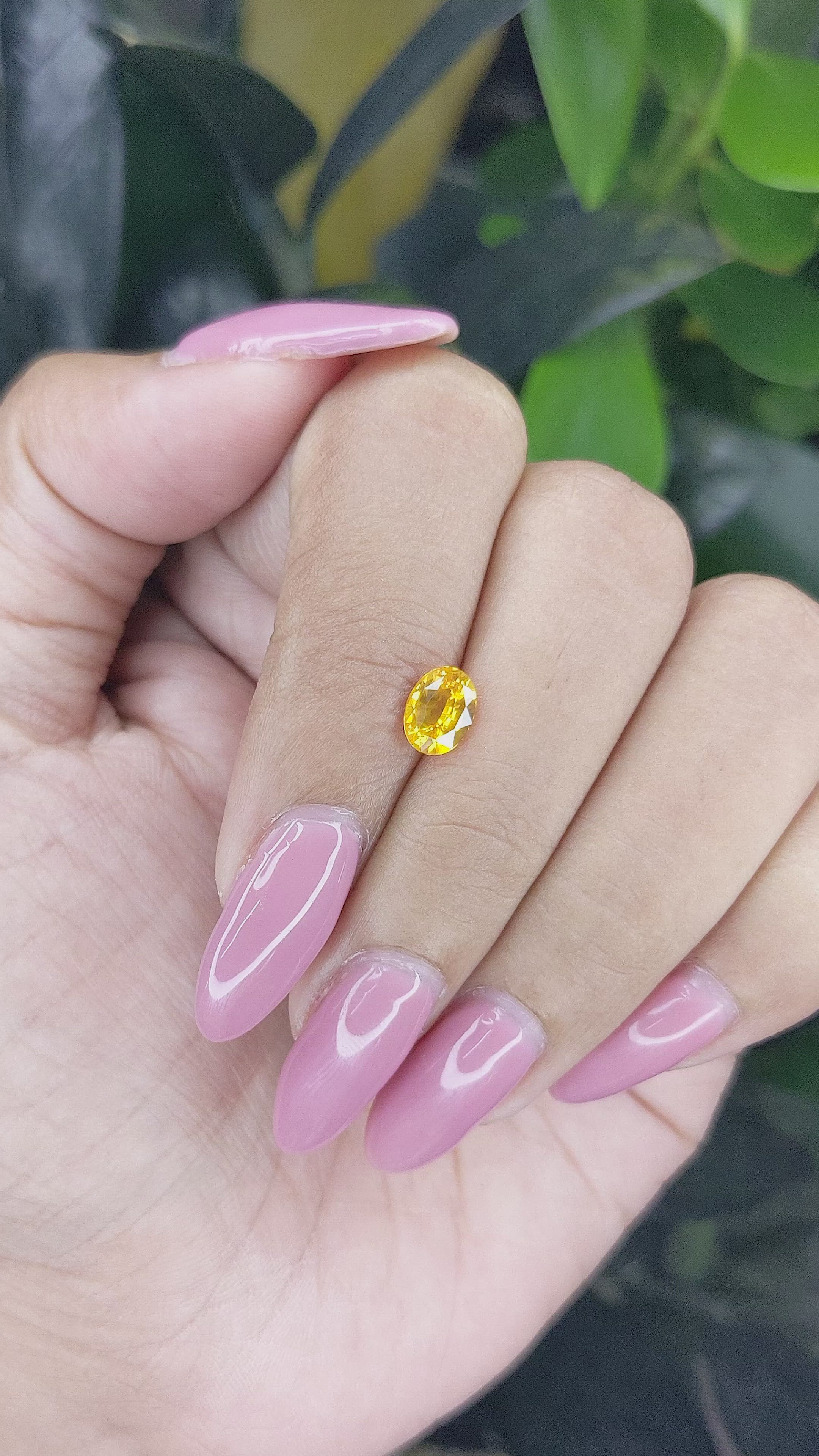 0.94 Ct. Orangish Yellow Sapphire from Ceylon (Sri Lanka) Size Video