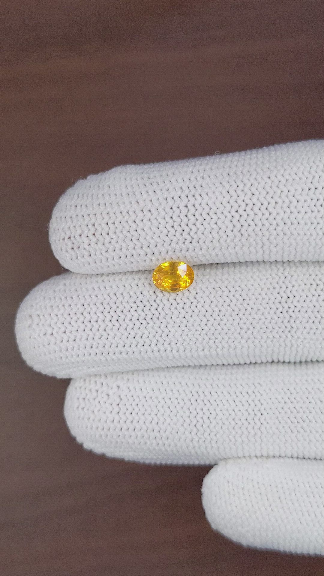 0.94 Ct. Orangish Yellow Sapphire from Ceylon (Sri Lanka) Size Video