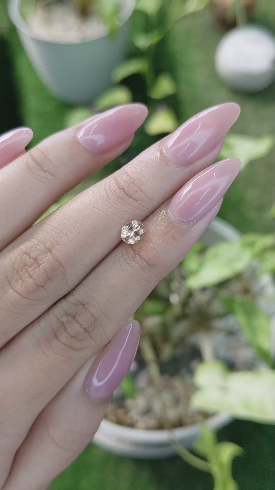 0.58 Ct. Peach Sapphire from Ceylon (Sri Lanka) Size Video